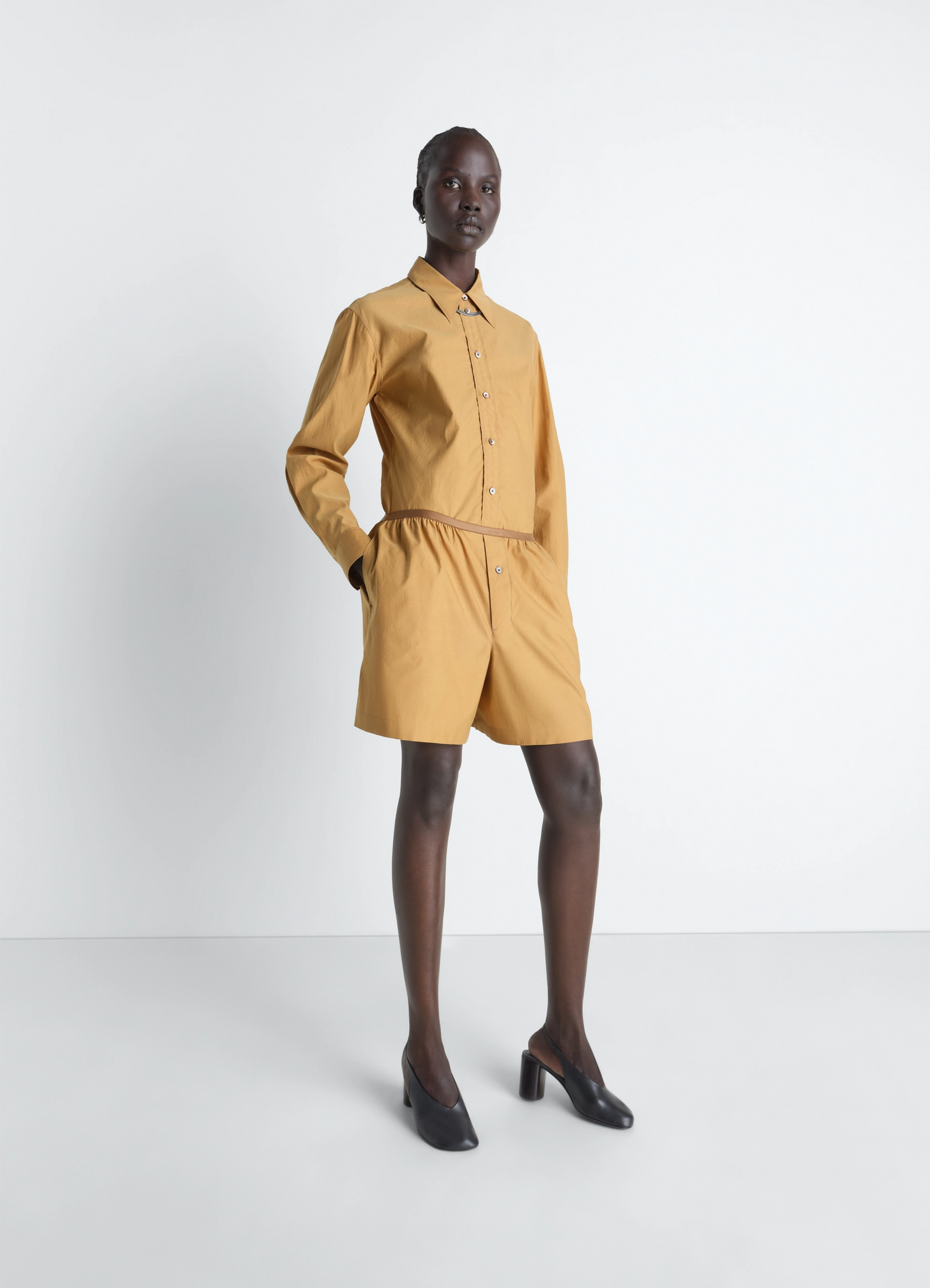 Pointed collar shirt in washed cotton silk, model shot, three-quarter view loose fit long sleeves