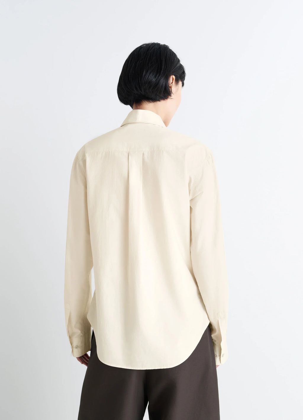 Pointed Collar Shirt in Washed Cotton-Silk Blend, model shot, back view curved hem