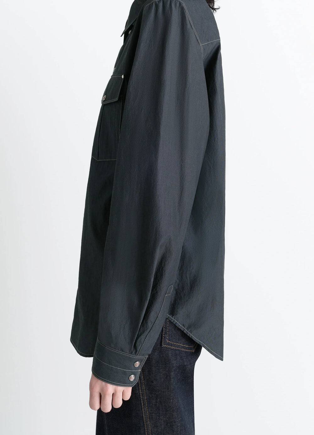 Chest-Pocket Fitted Shirt in Dark Cotton Crepe, model shot, side view angled hem, double cuffs