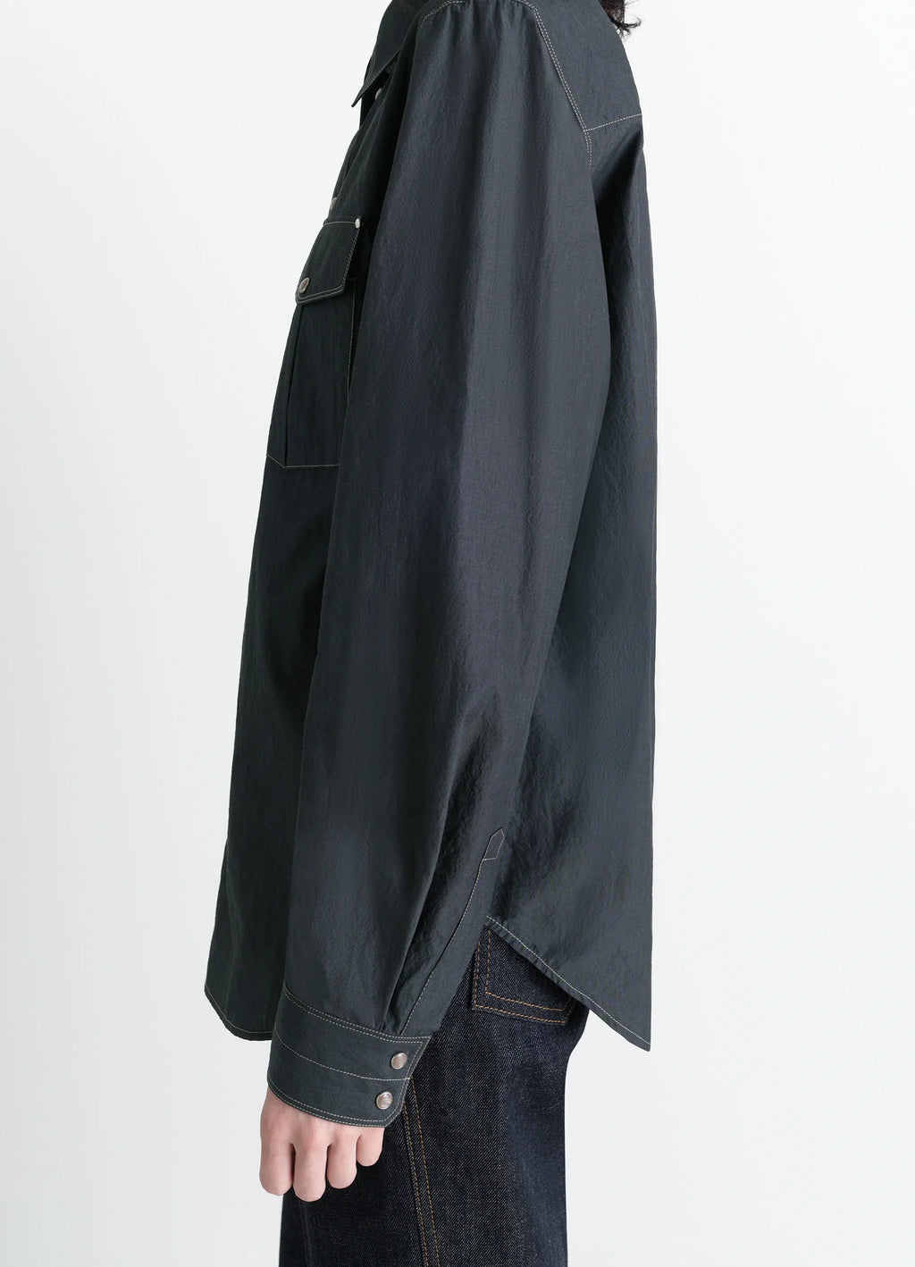 Chest-Pocket Fitted Shirt in Dark Cotton Crepe, model shot, side view angled hem, double cuffs