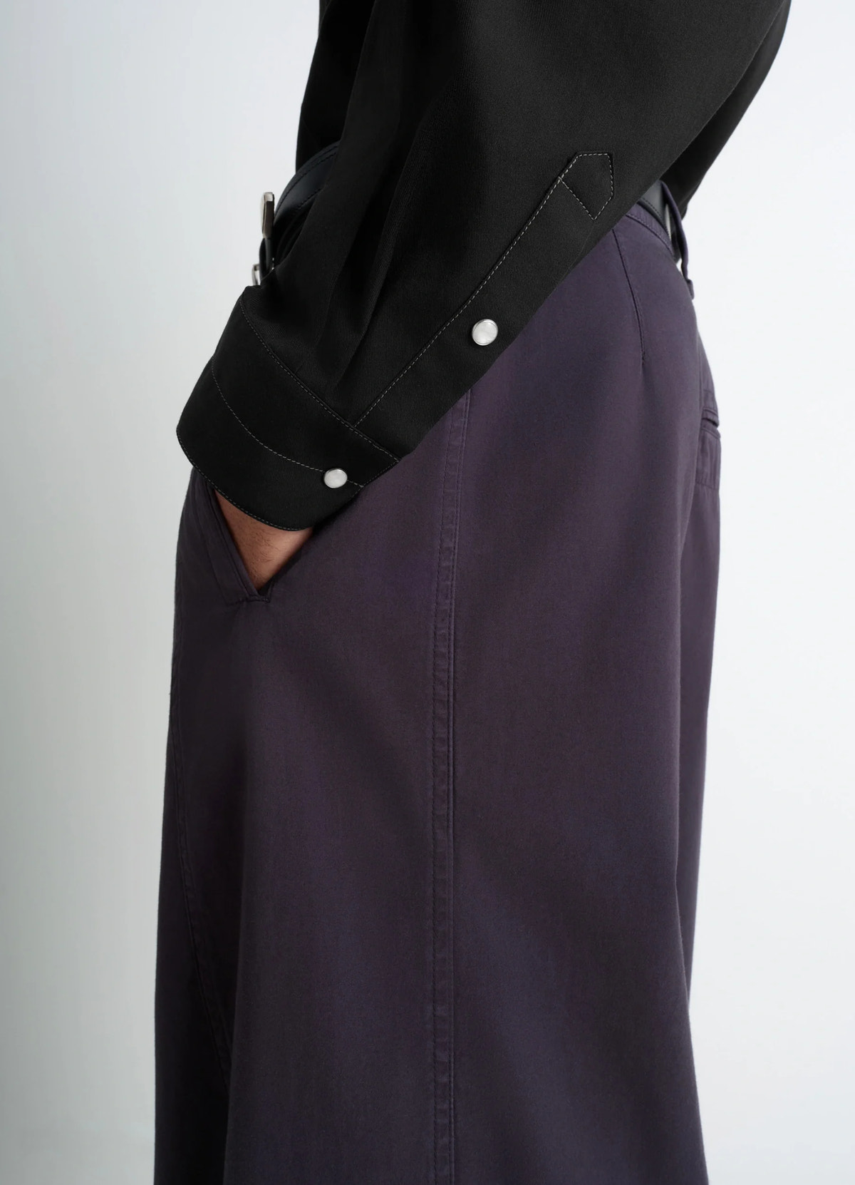 Western shirt in black cotton twill, model shot, side detail shot snap button cuff