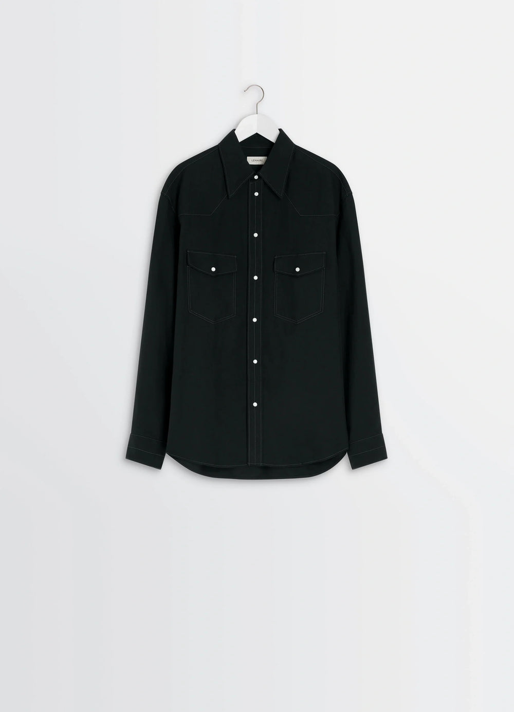 Western Shirt in Black Cotton Twill, product shot, hanging front view two chest pockets, curved hem