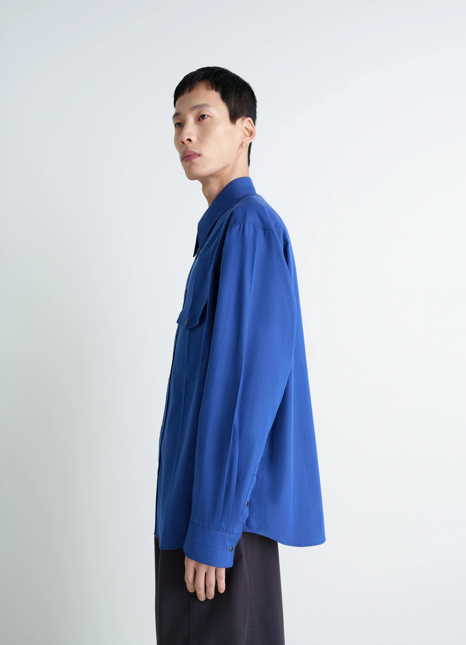 Western shirt in not specified, model shot, side view loose fit silhouette