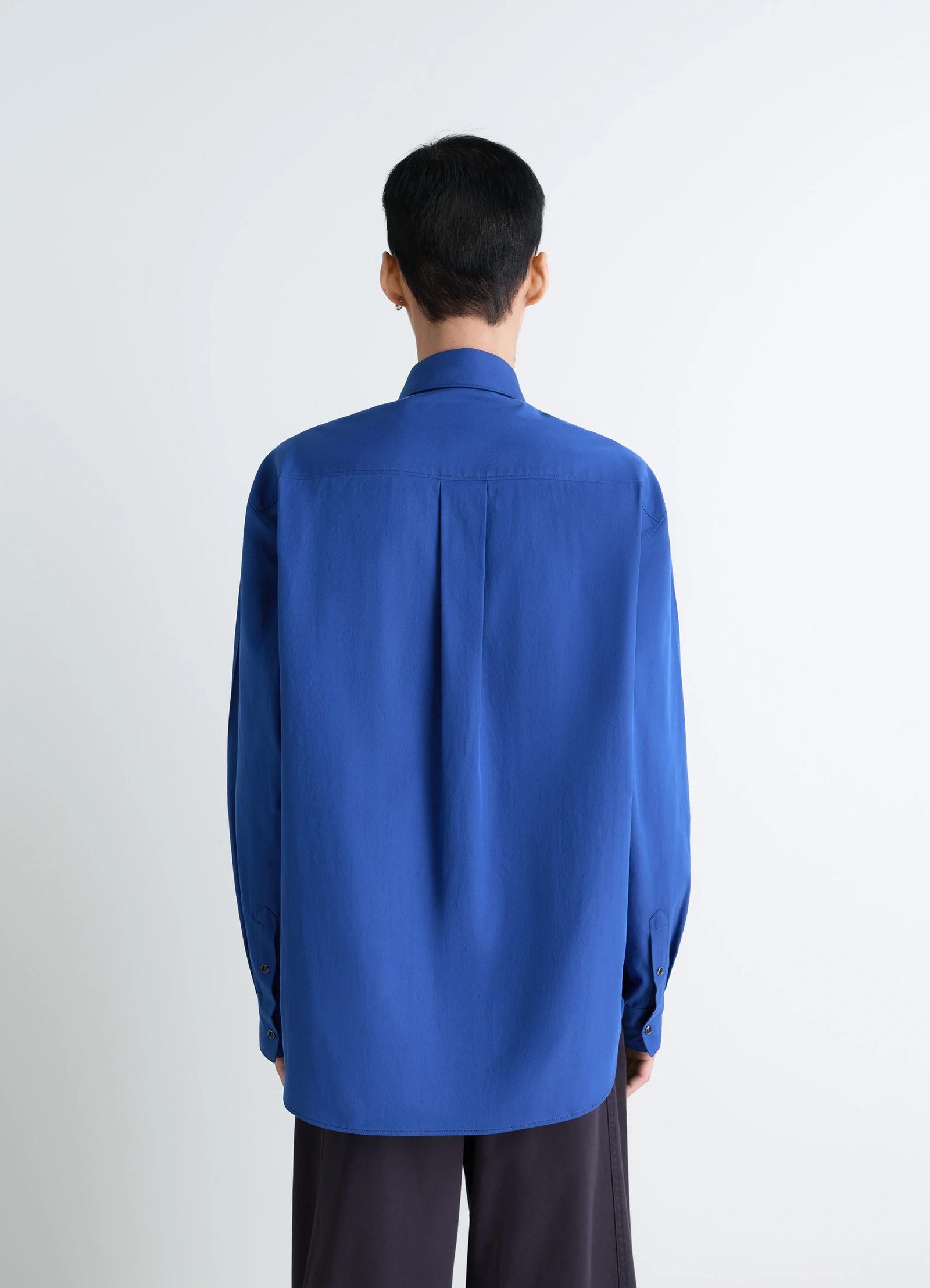 Western shirt in not specified, model shot, back view single pleat back