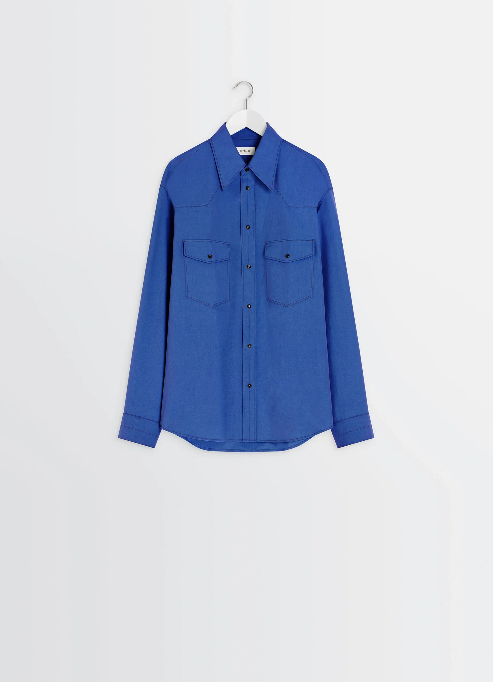 Western shirt in not specified, product shot, hanging view dual front pockets