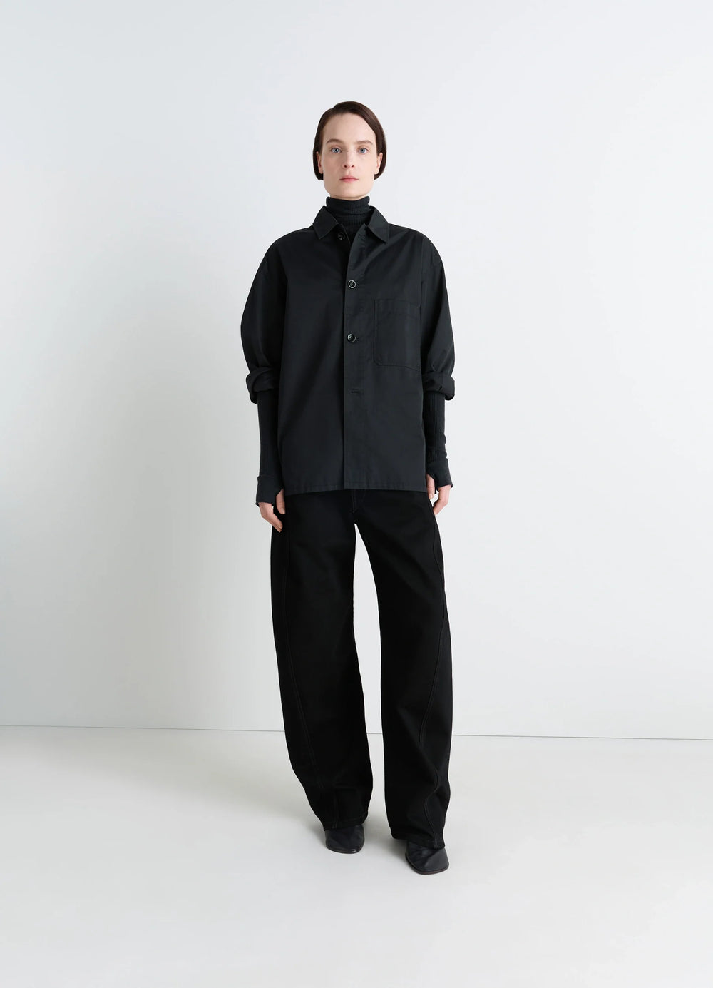 Lemaire Pyjama Shirt in Black Lightweight Cotton, model shot, three-quarter view button-down collar
