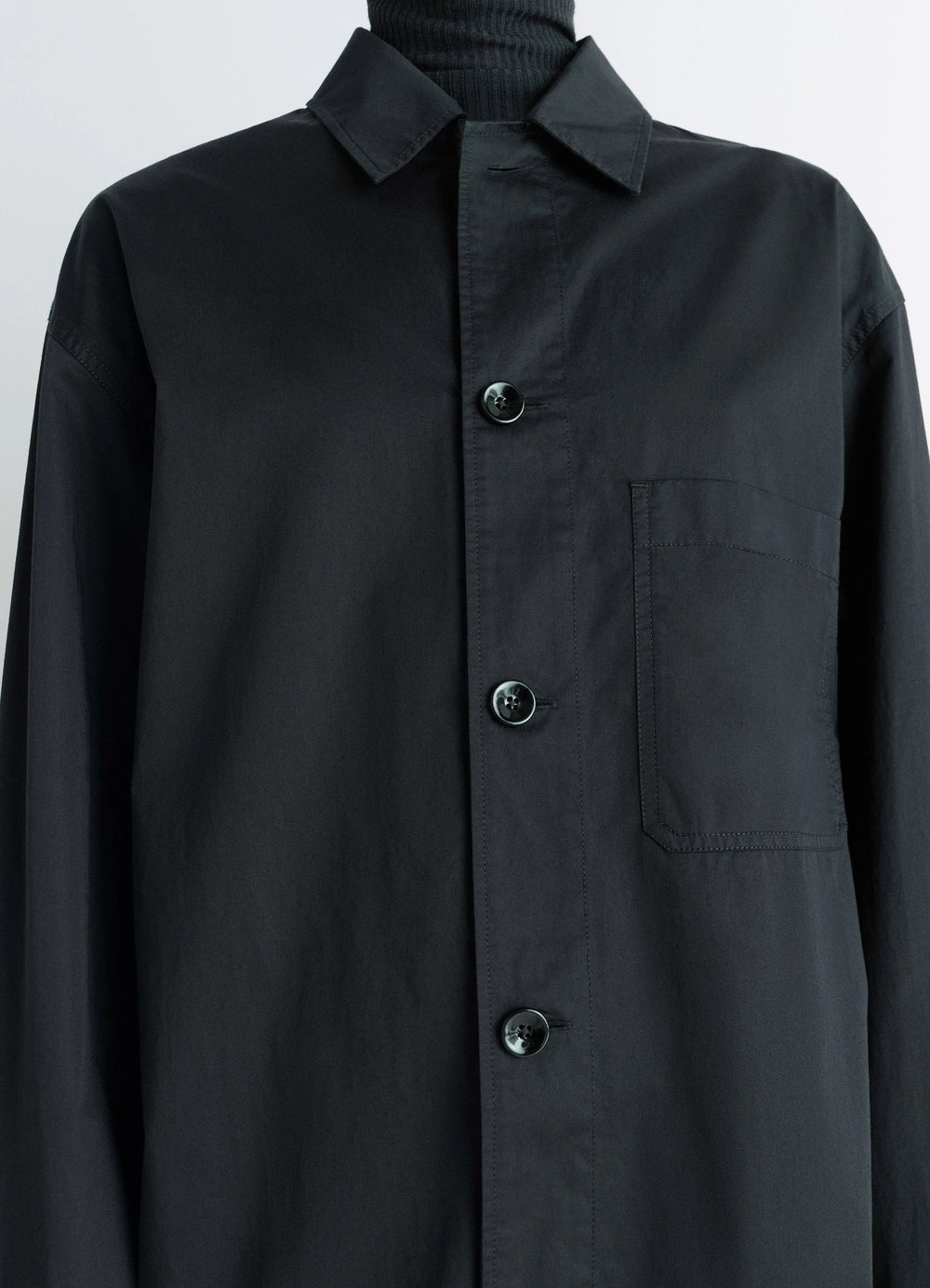 Lemaire Pyjama Shirt in Black Lightweight Cotton, model shot, close-up detail chest pocket visible