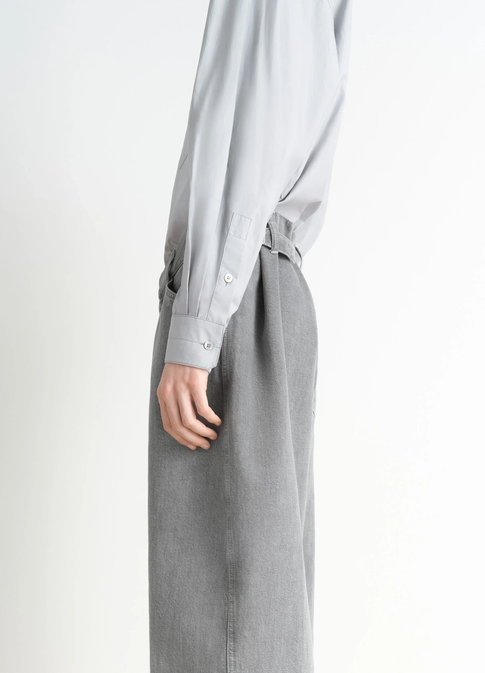 Lemaire regular shirt in washed cotton silk, model shot, side view long cuffed sleeves
