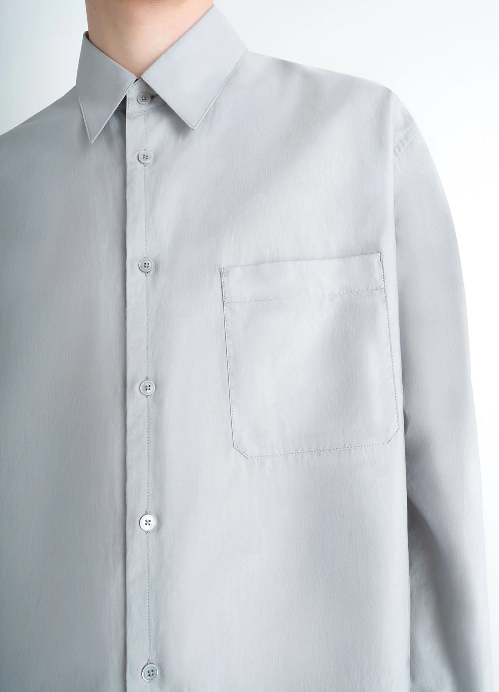 Lemaire Regular Shirt in Washed Cotton Silk, model shot, close-up view single chest pocket