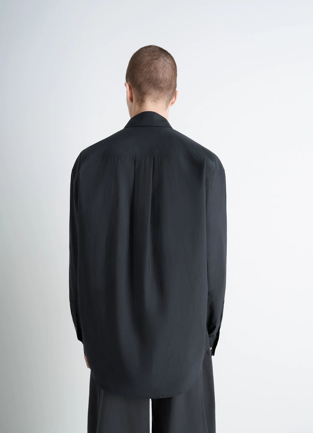 Lemaire Regular Shirt in Washed Cotton Silk, model shot, back view relaxed fit hemline