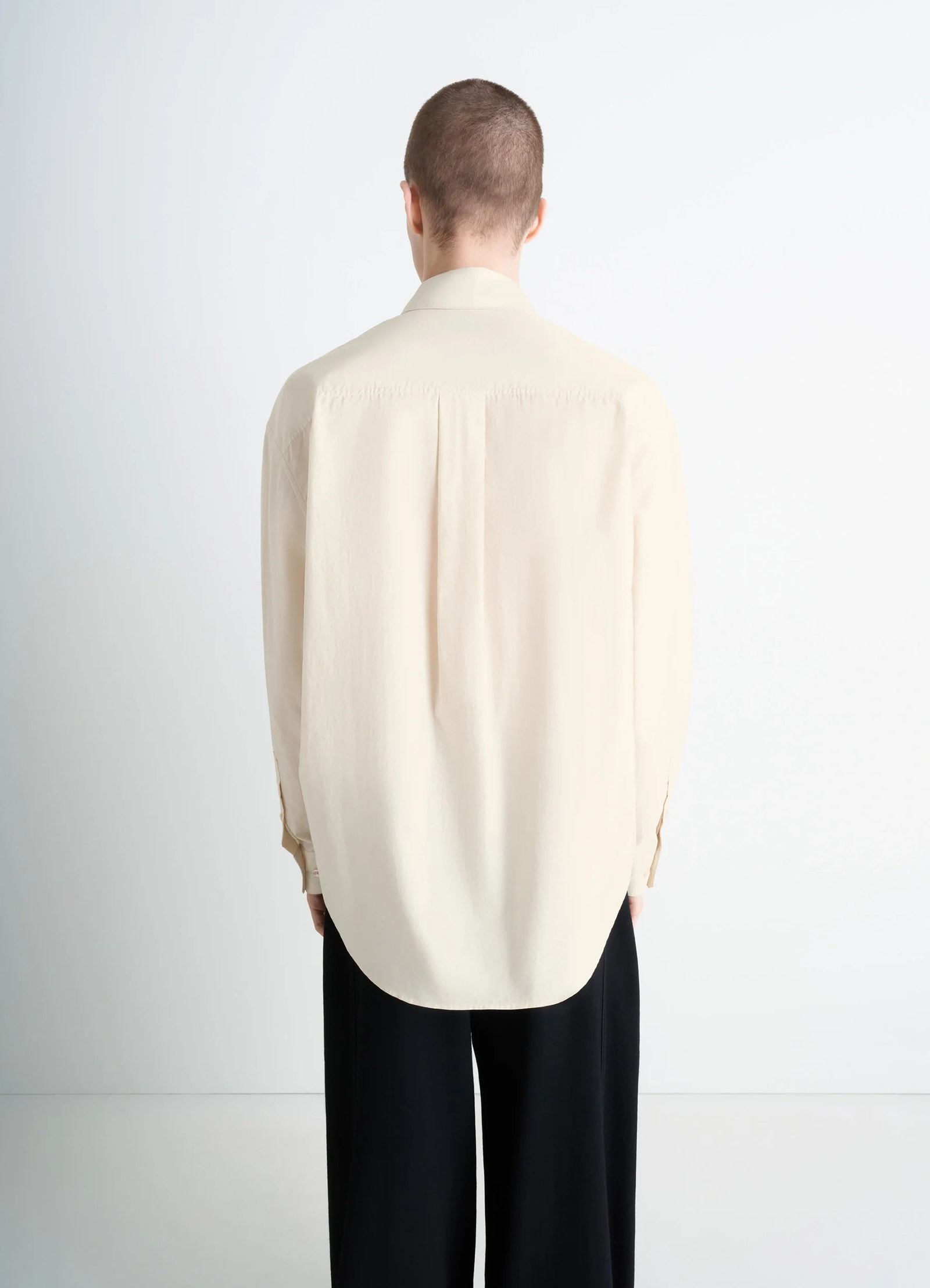 Lemaire regular shirt in washed cotton and silk, model shot, back view curved hem