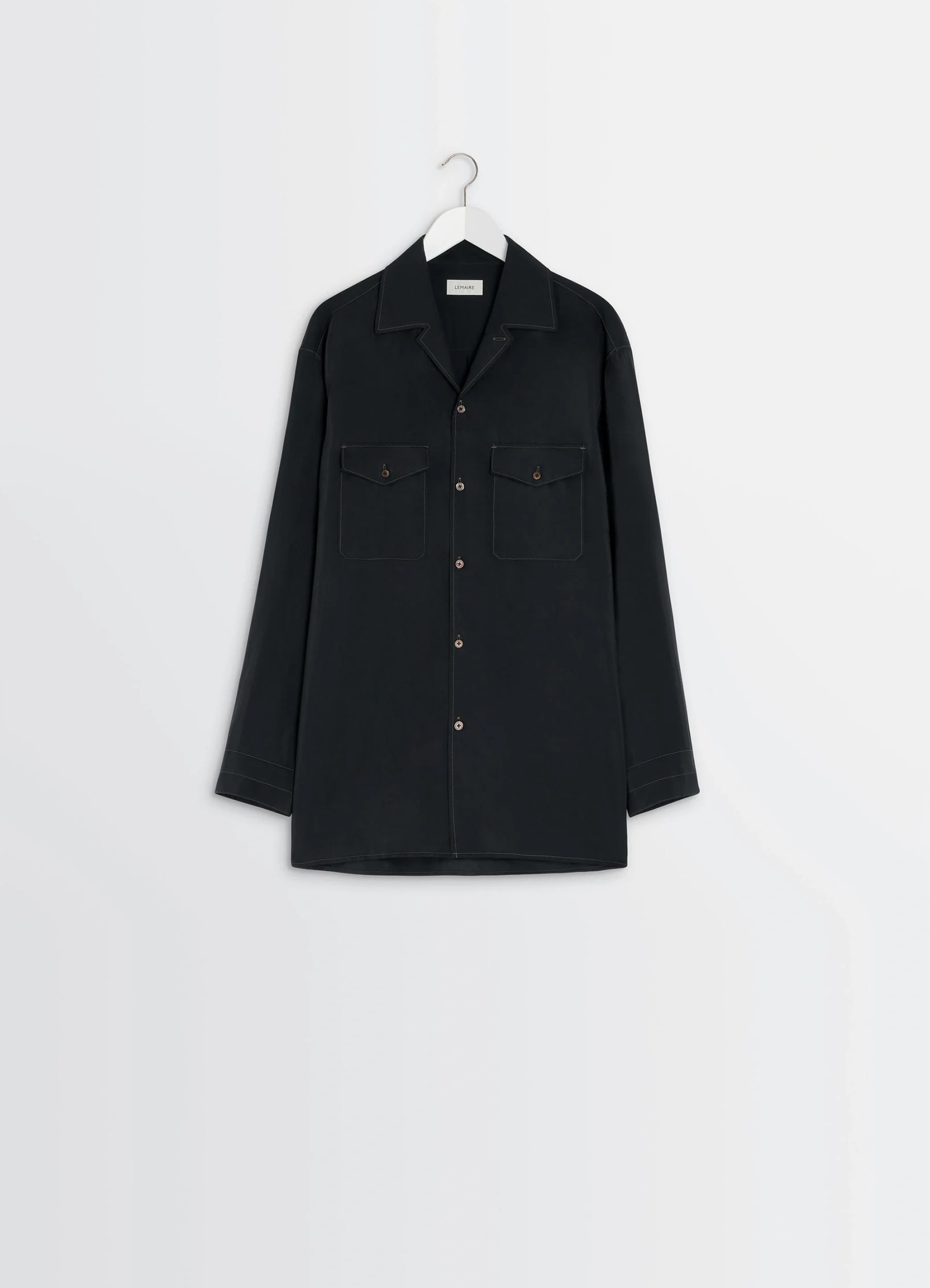 Lemaire convertible collar shirt in black dry silk blend, product shot, hanging display view buttoned front hanging