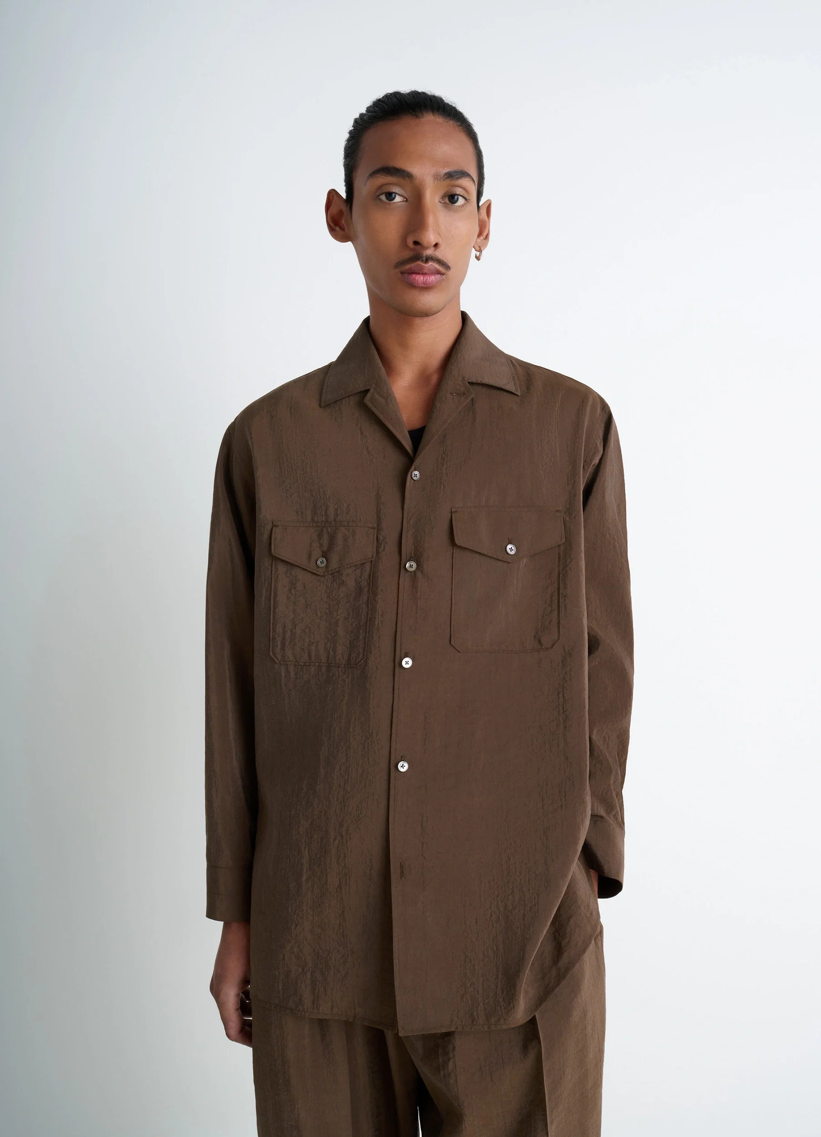 Lemaire convertible collar shirt in brown dry silk blend, model shot, front view convertible collar, loose fit