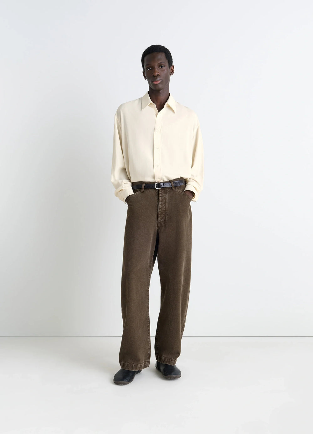 Lemaire Relaxed Shirt in Light Viscose Wool Blend, model shot, three-quarter view long sleeves draped