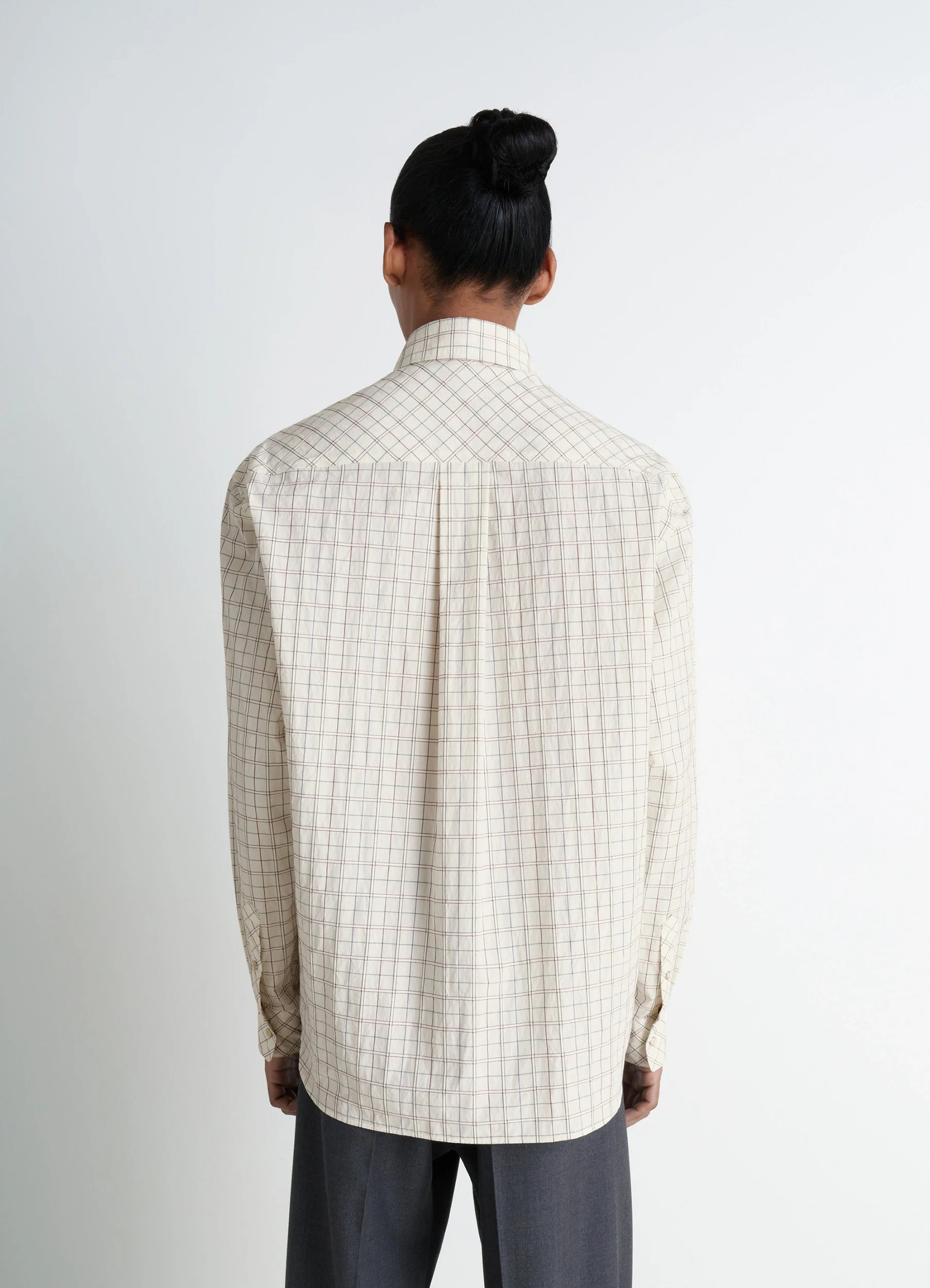 Western check shirt in textured cotton plaid, model shot, back view straight back pleat
