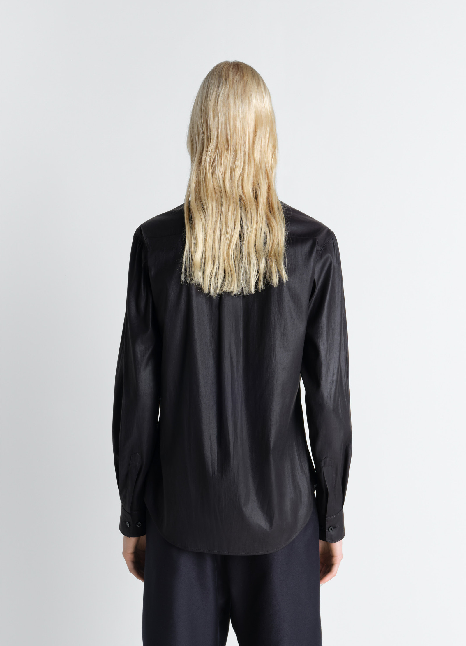 Pointed collar surrealist shirt in chintzed toile, model shot, back view draped long sleeves