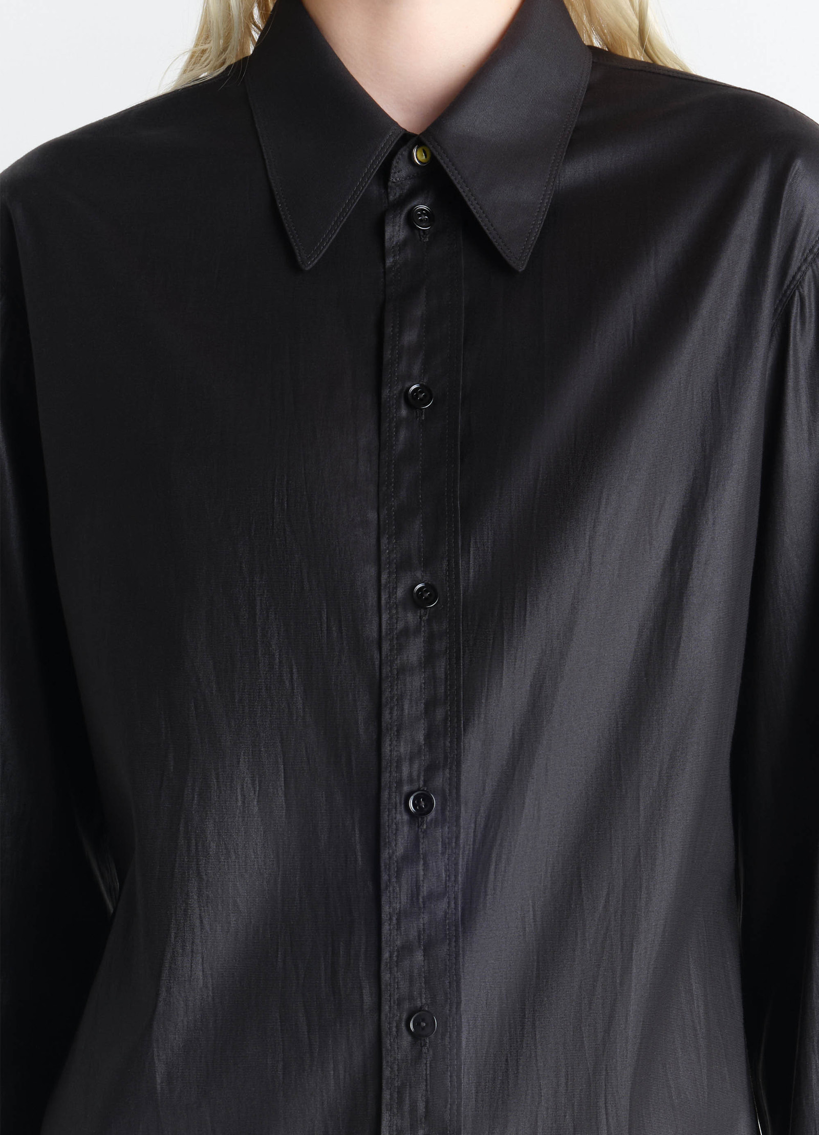 Pointed collar surrealist shirt in chintzed toile, model shot, close-up front detail collar and button focus