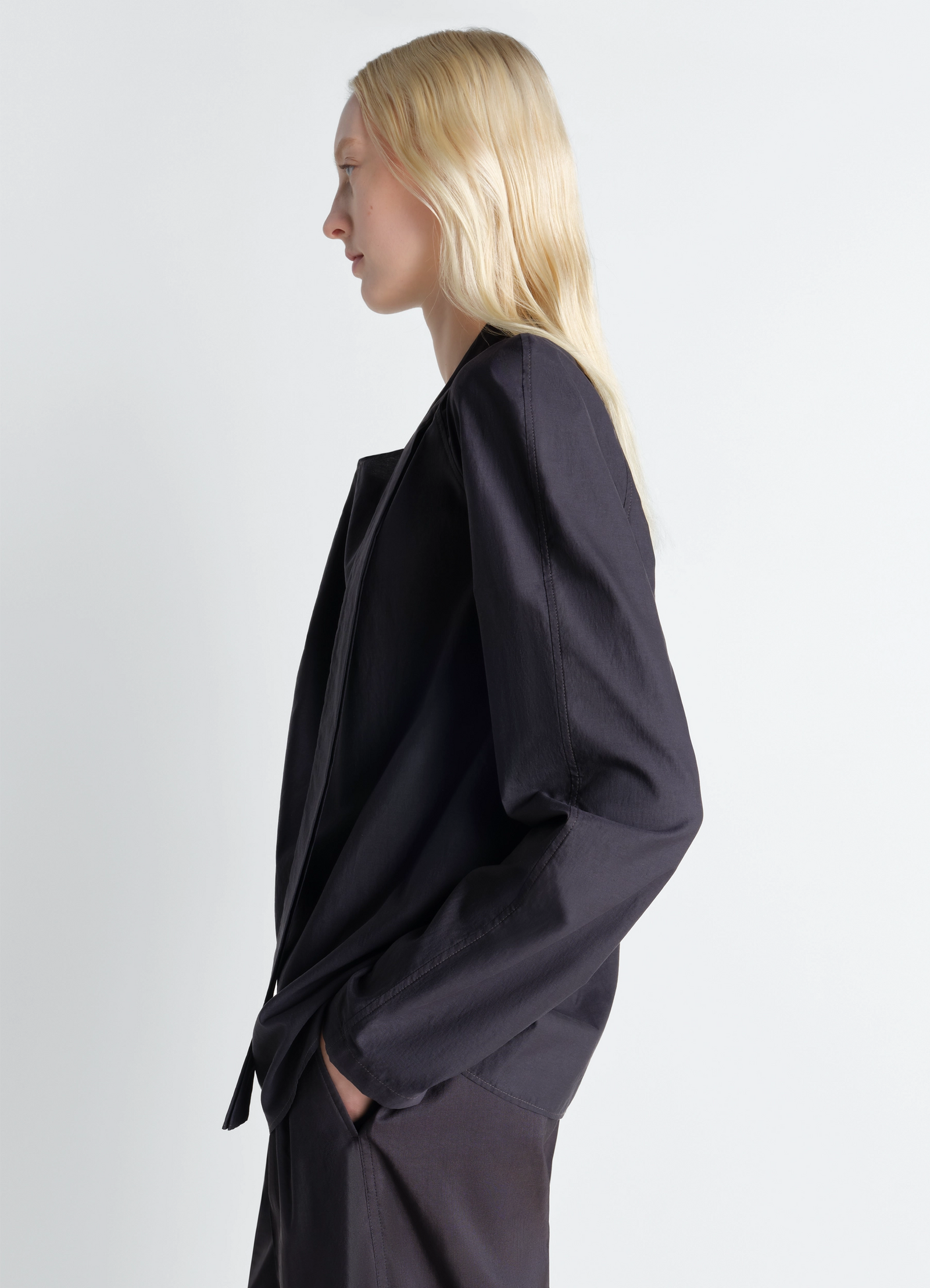 Ascot blouse in washed cotton silk in washed cotton silk, model shot, side profile view side pocket detail