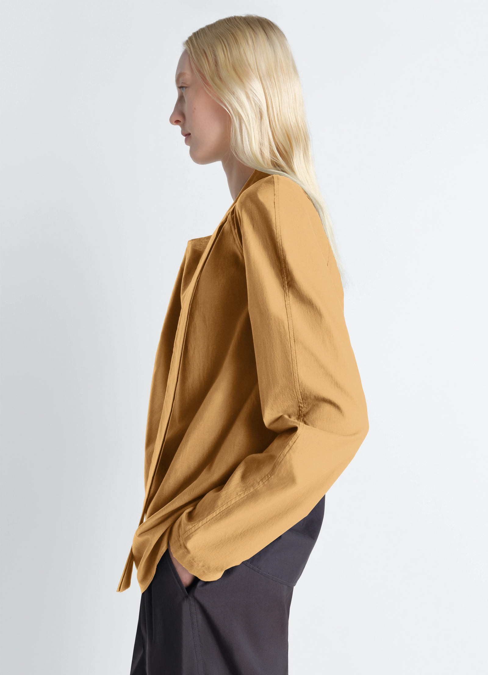 Ascot blouse in washed cotton silk, model shot, profile view draped shoulder