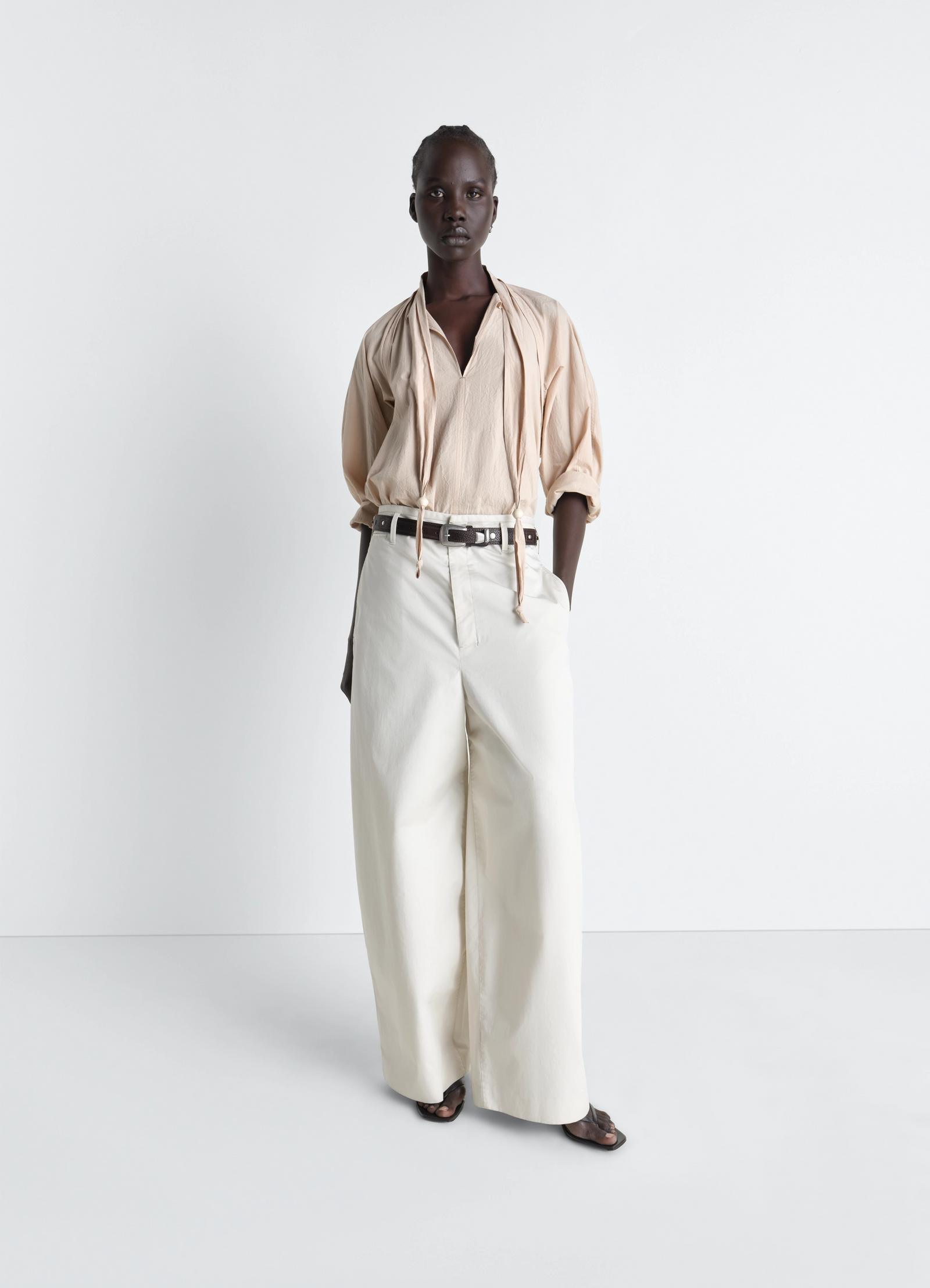 Lemaire blouse with scarf in crepe cotton, model shot, side view loose sleeves