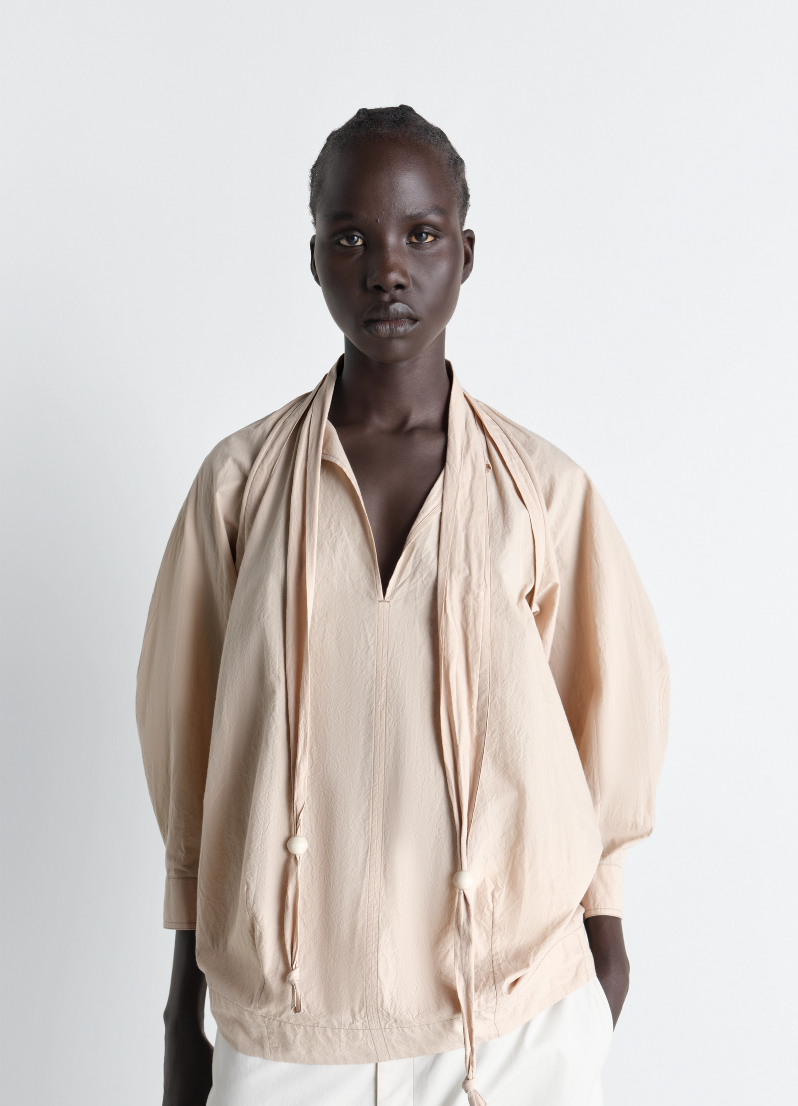 Lemaire blouse with scarf in crepe cotton, model shot, front view integrated scarf detail