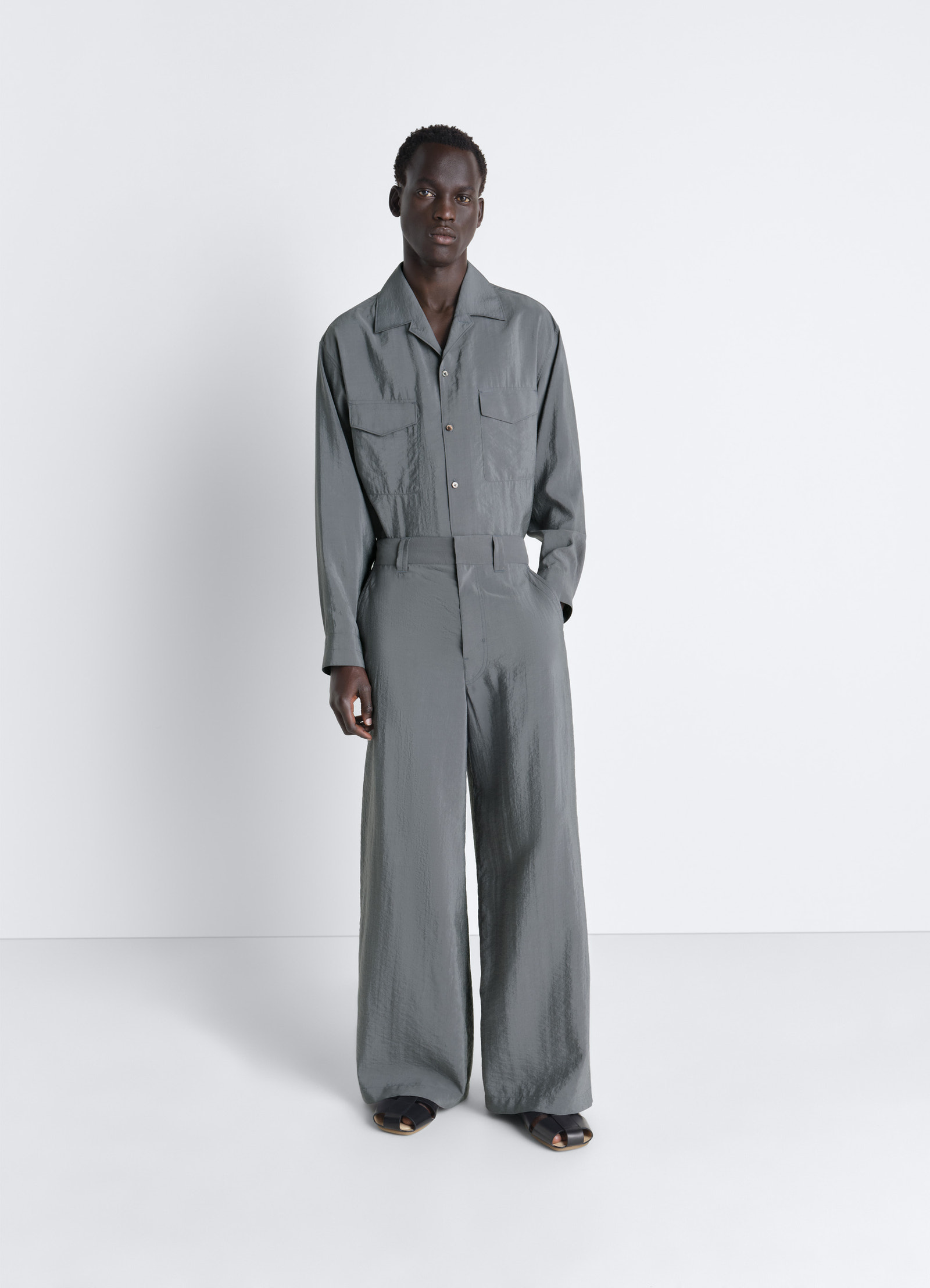 Lemaire convertible collar shirt in dry silk, model shot, three-quarter view long sleeves, chest pockets