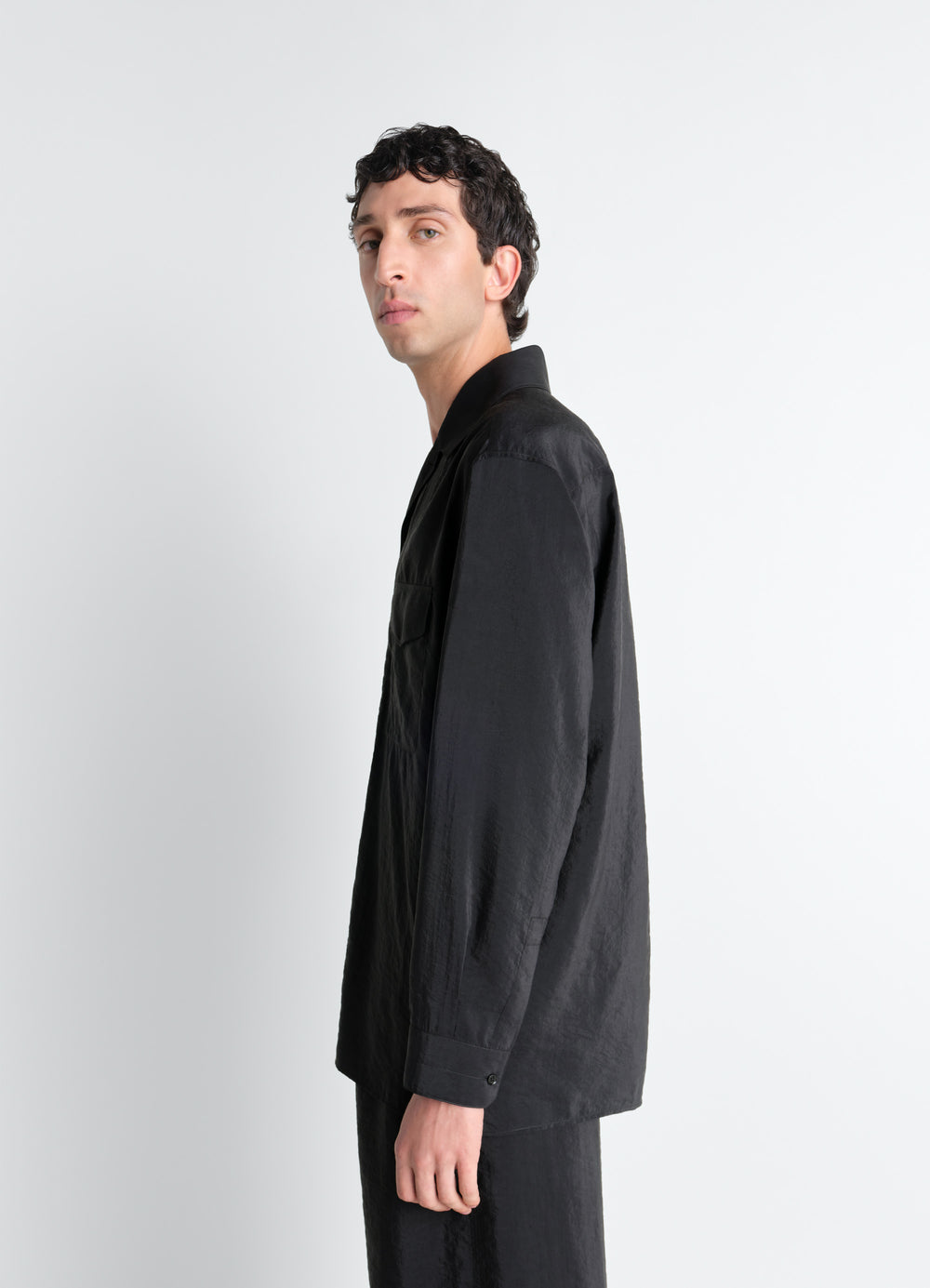 Lemaire Convertible Collar Shirt in Dry Silk, model shot, side view long sleeve casual
