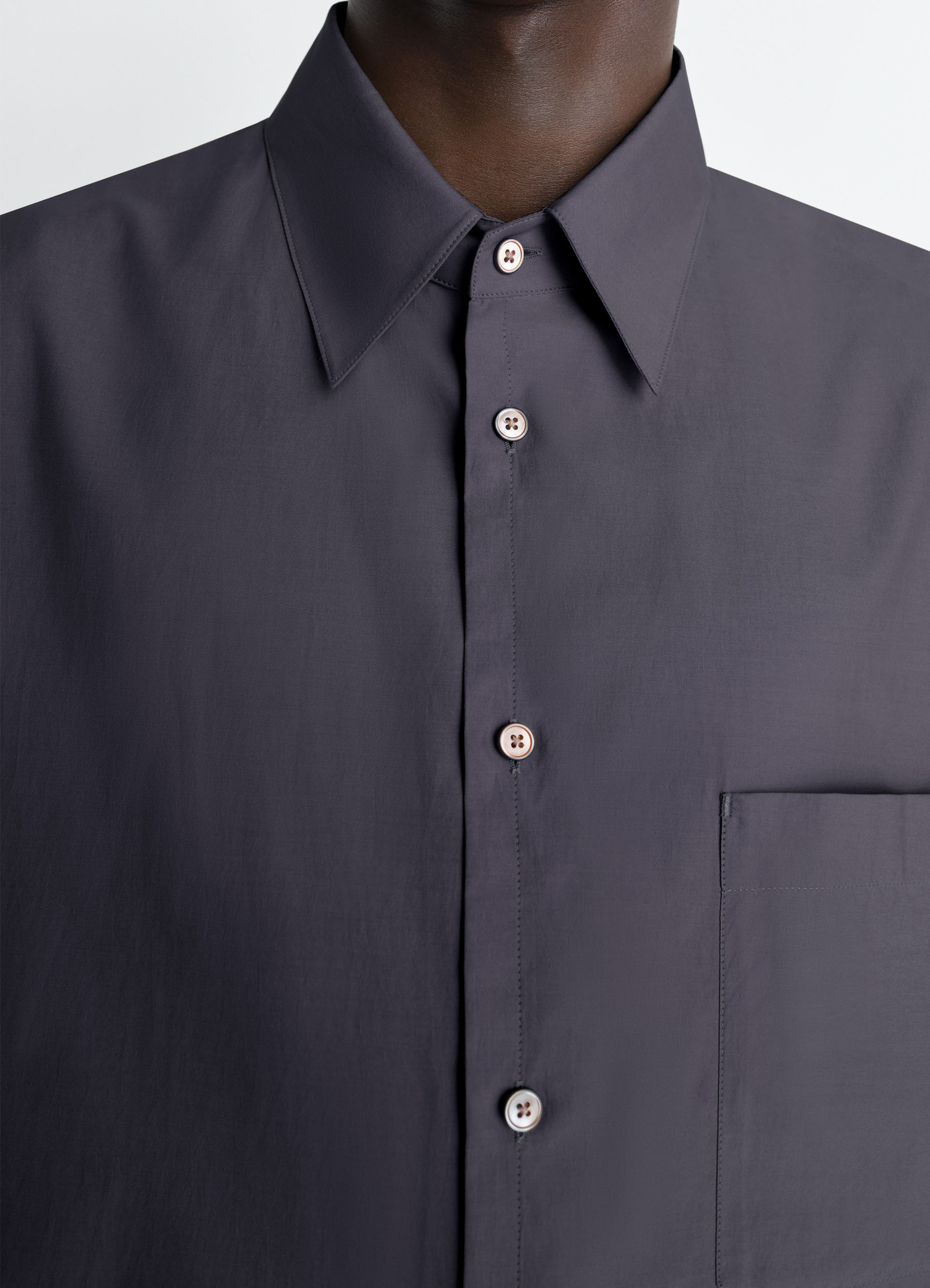 Regular shirt in washed cotton silk, model shot, detail shot close-up of buttons
