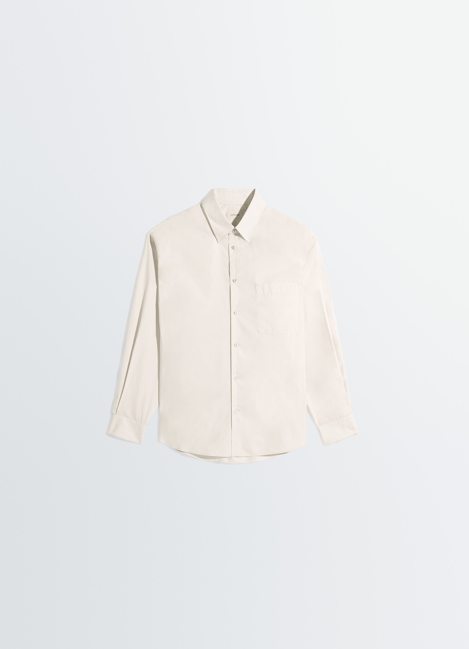 Regular shirt in washed cotton silk, product shot, angled top view single chest pocket