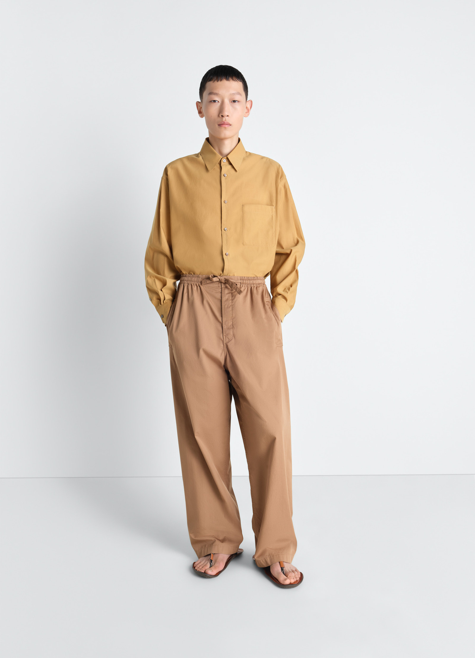 Lemaire regular shirt in washed cotton silk, model shot, full body view buttoned casual look