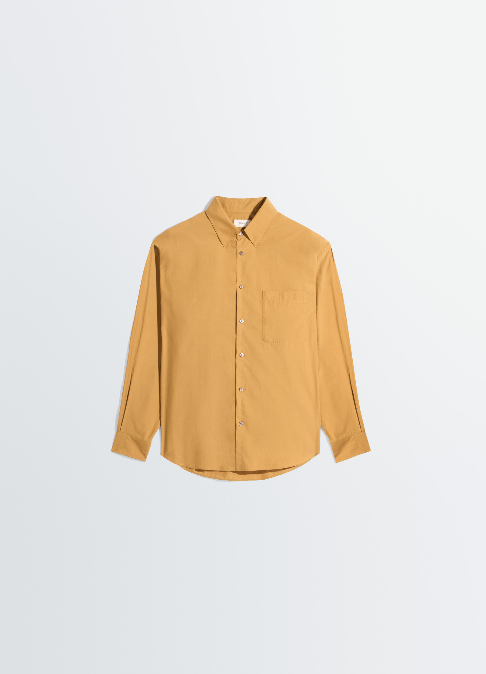 Lemaire regular shirt in washed cotton silk, product shot, angled top view visible stitching cuffs
