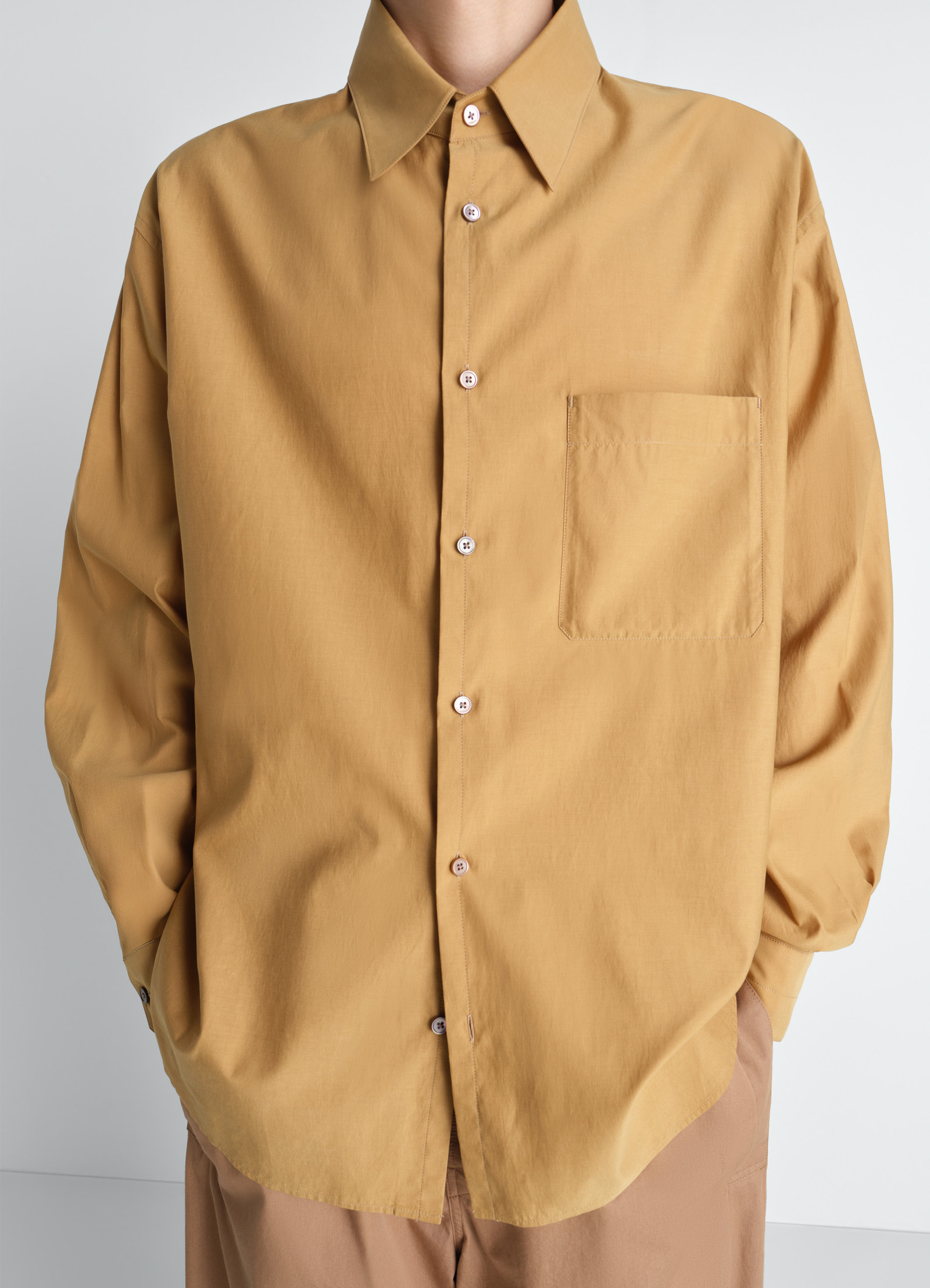 Lemaire regular shirt in washed cotton silk, model shot, close-up view relaxed fit dropped shoulder