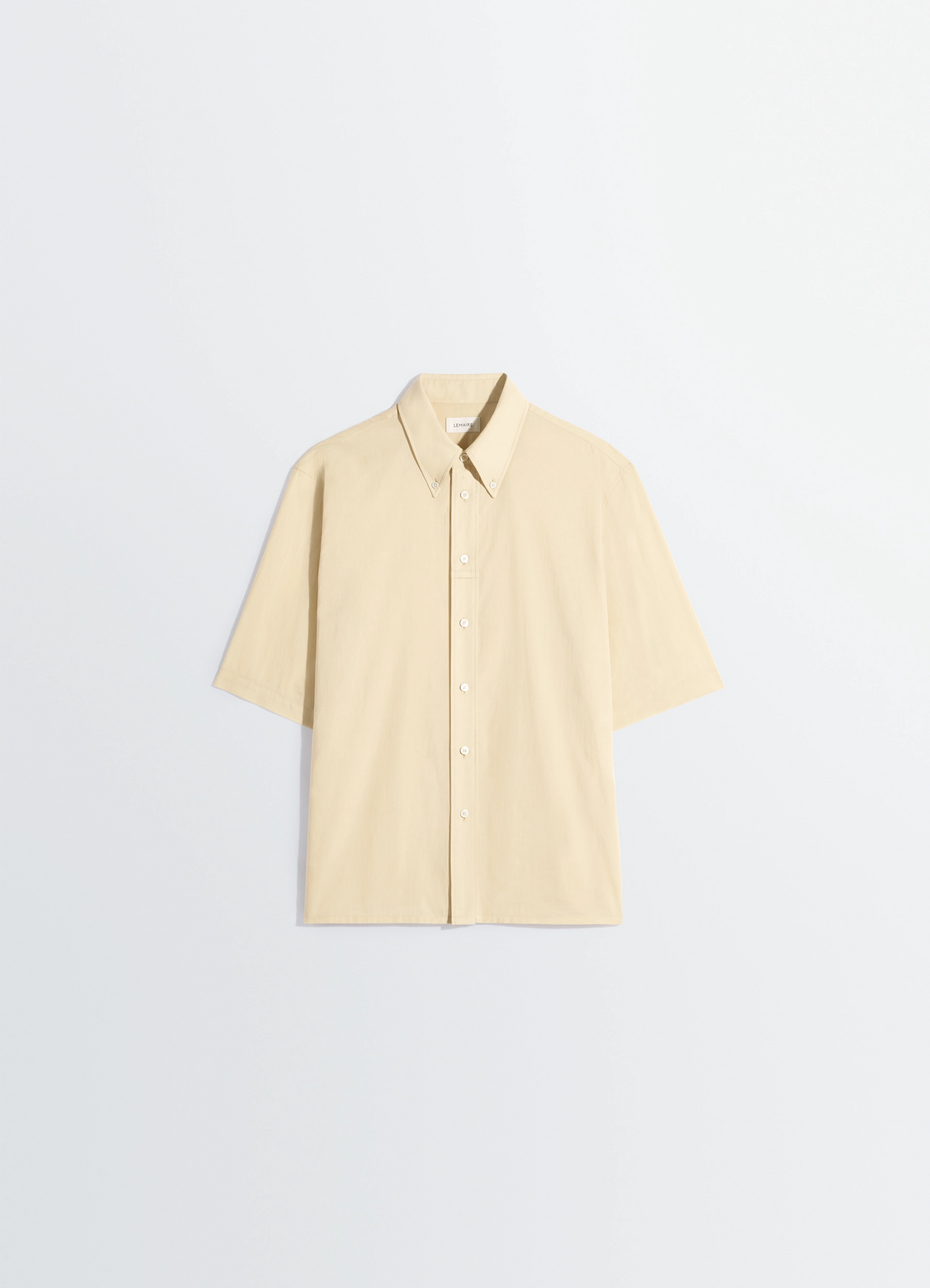 Short sleeve shirt in washed cotton muslin, product shot, flat lay view minimalist design