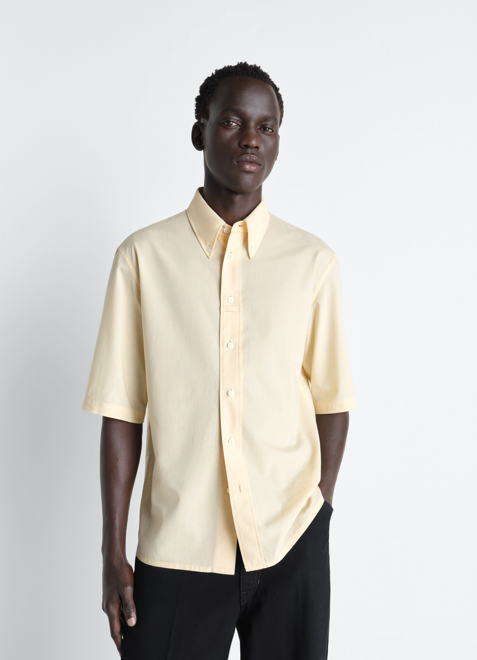 Short sleeve shirt in washed cotton muslin, model shot, front view button-down collar
