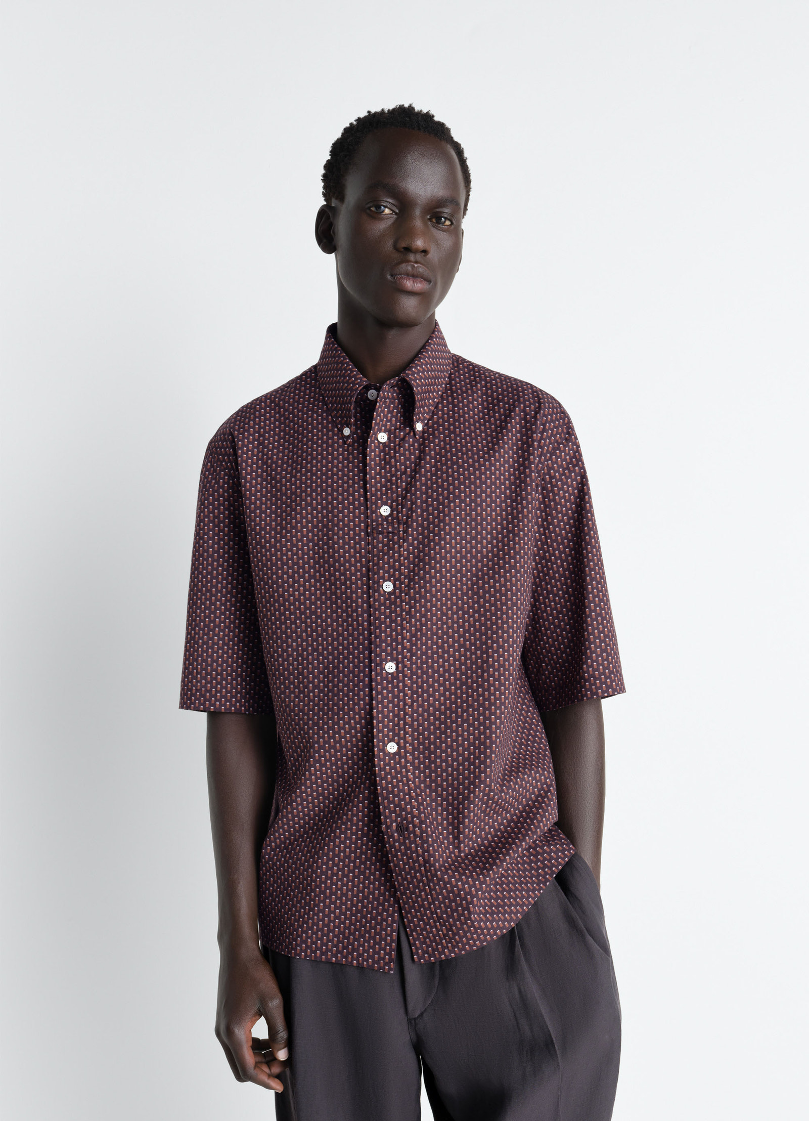 Lemaire short sleeve shirt in geometric printed cotton, model shot, front view button-down collar