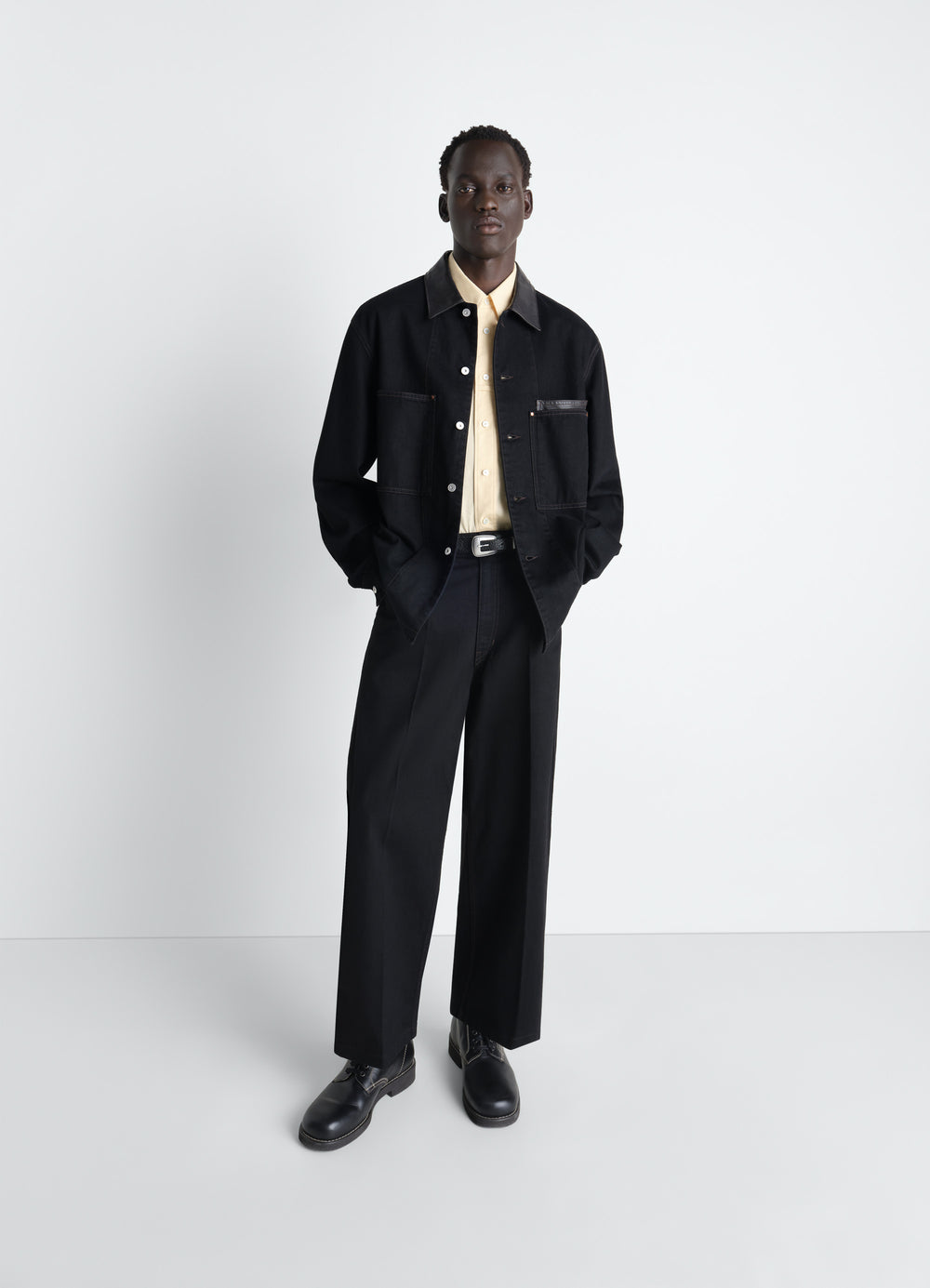 Workwear Overshirt with Leather Col in Black Denim and Leather, model shot, front view oversized fit with side pockets