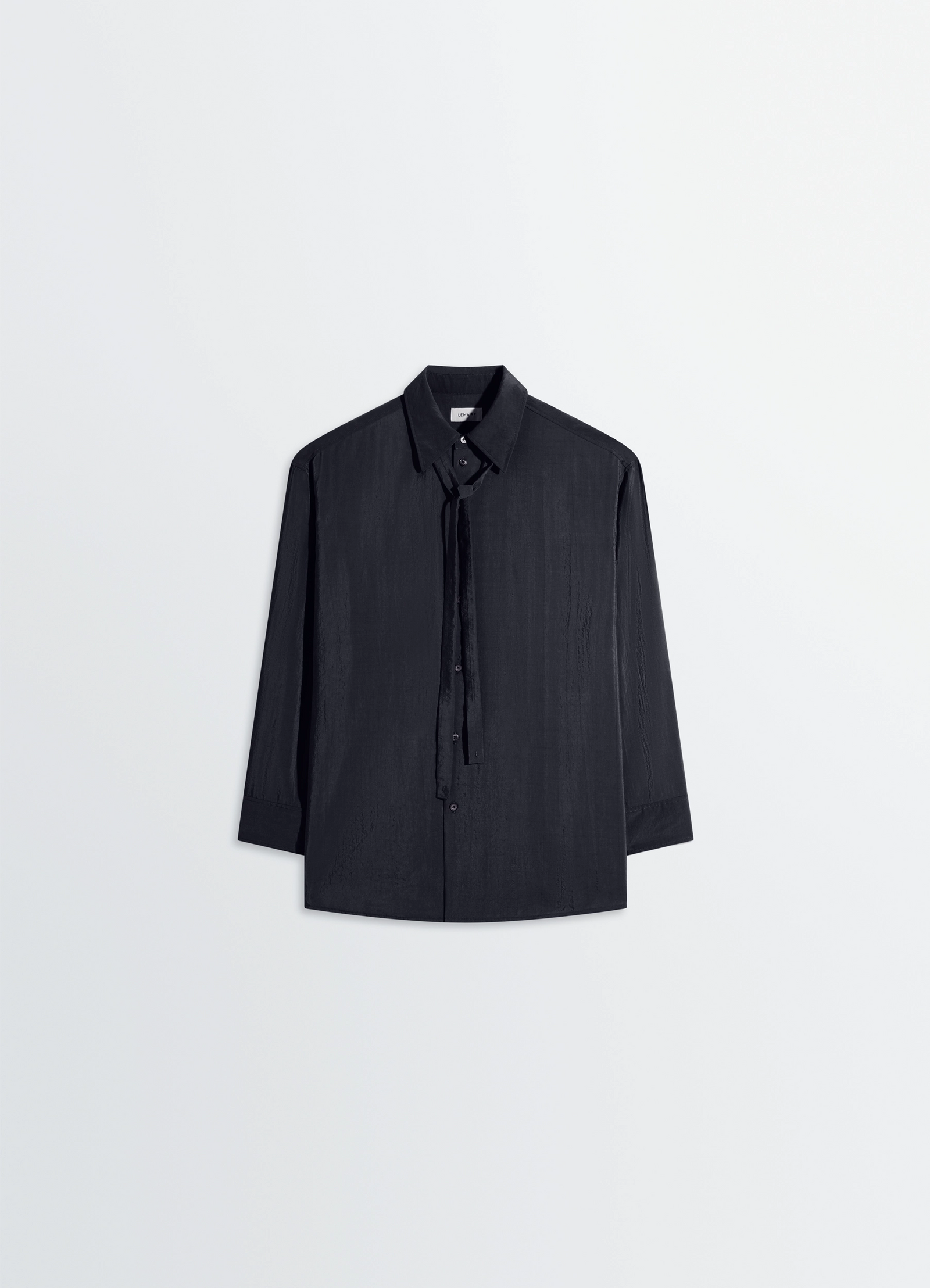 Lemaire long shirt with tie in black dry silk blend, product shot, hanging flat shot long sleeves visible