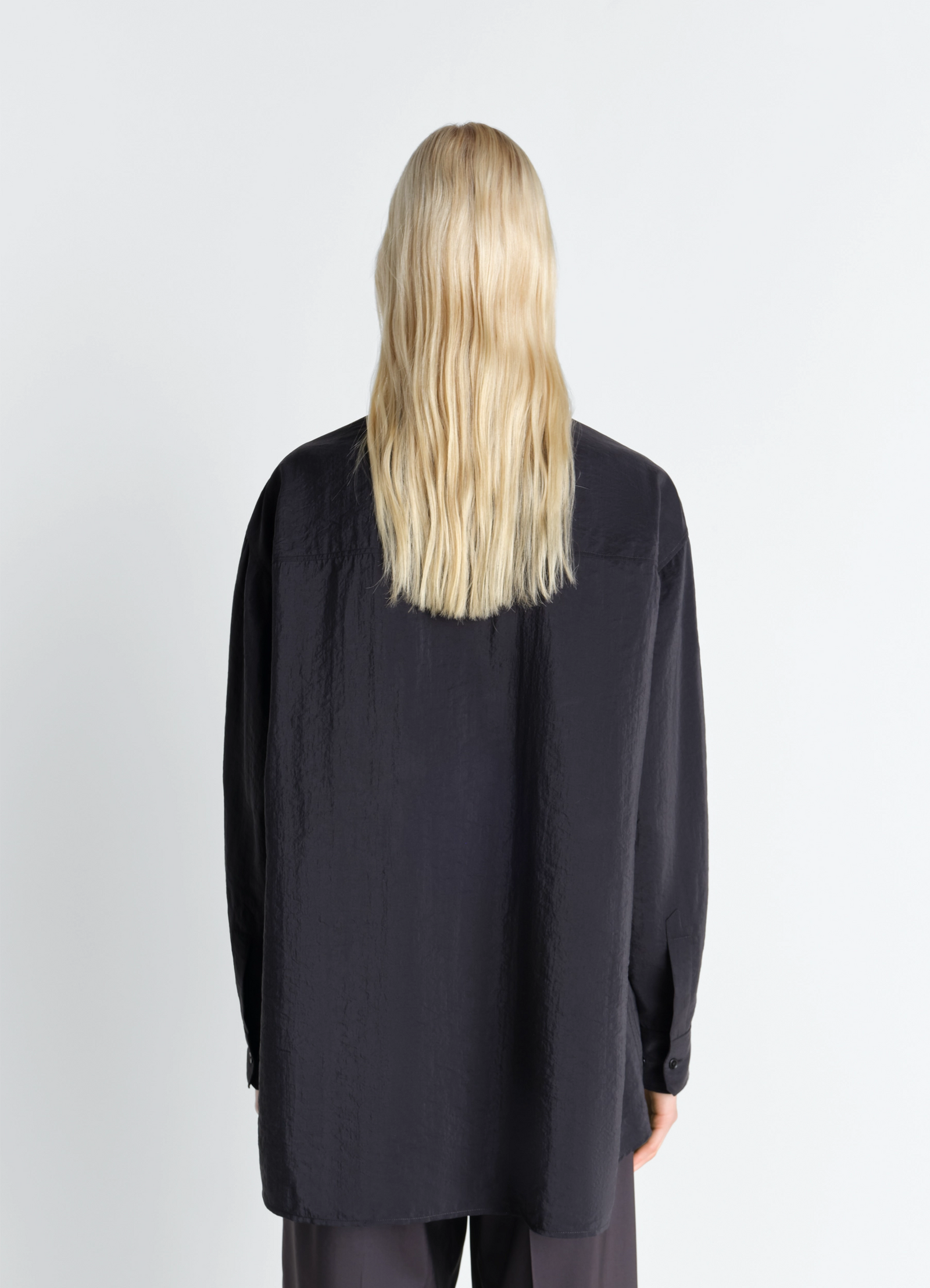 Lemaire long shirt with tie in black dry silk blend, model shot, back view draped loose fit