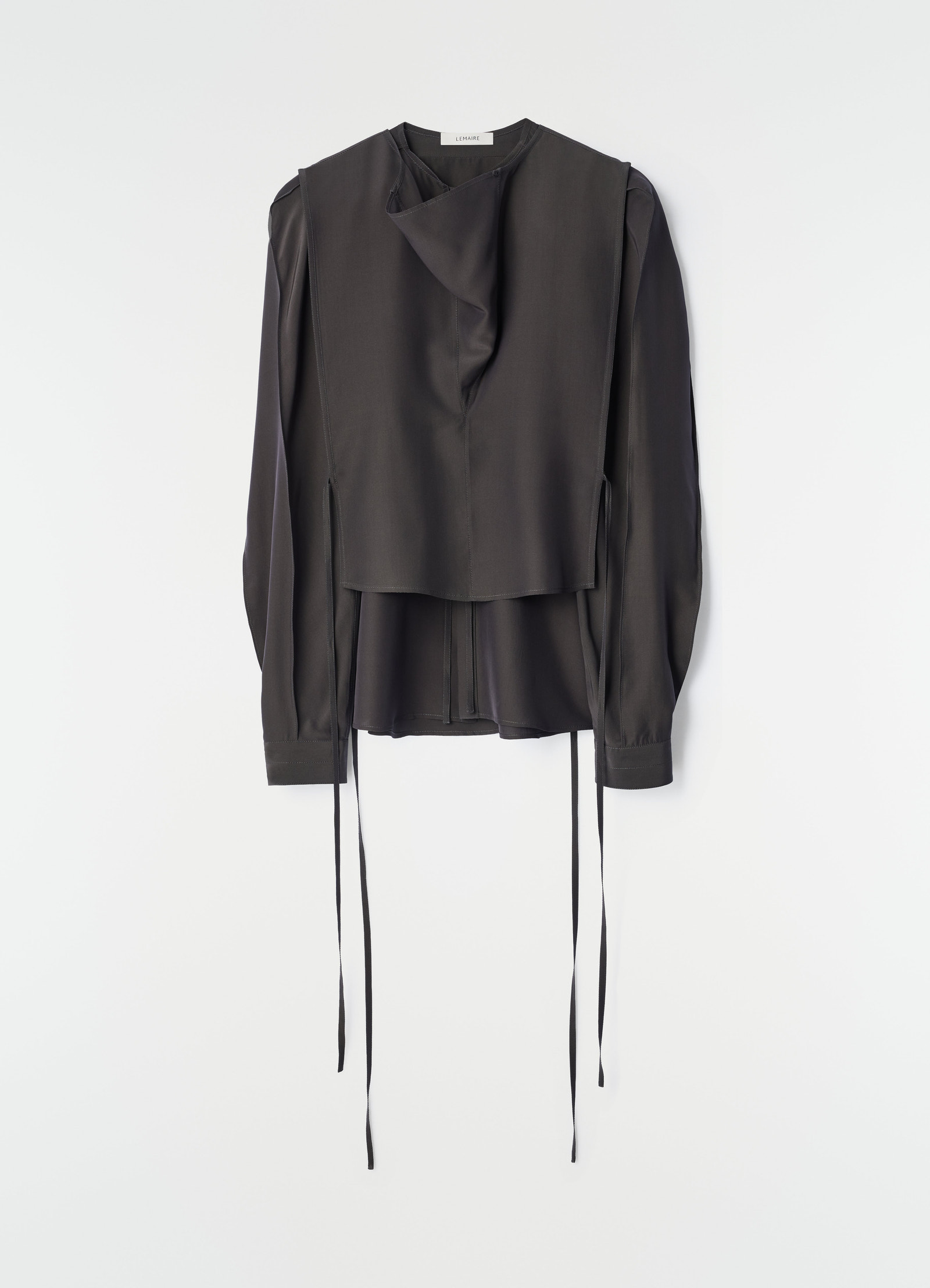 Layered black silk and viscose blouse with long ties by lemaire flat lay on white background