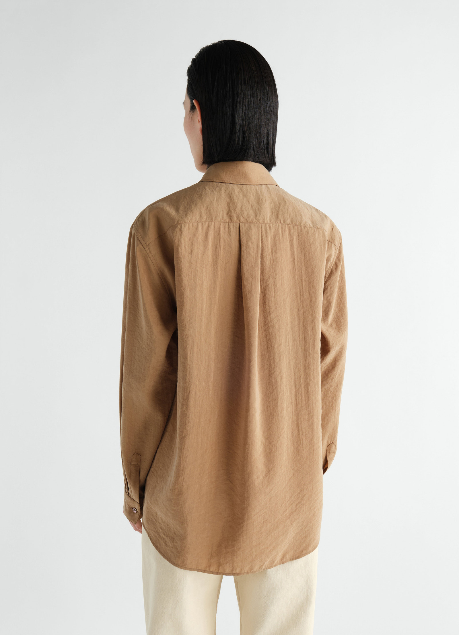Straight shirt in camel dry silk worn by model back view lemaire