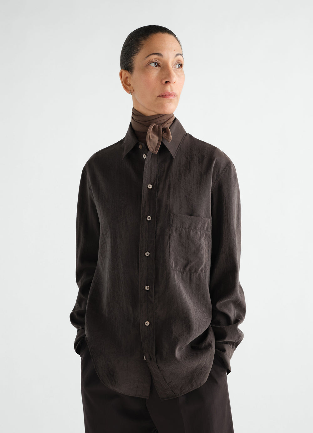 Straight shirt in dark brown dry silk worn by model front view LEMAIRE