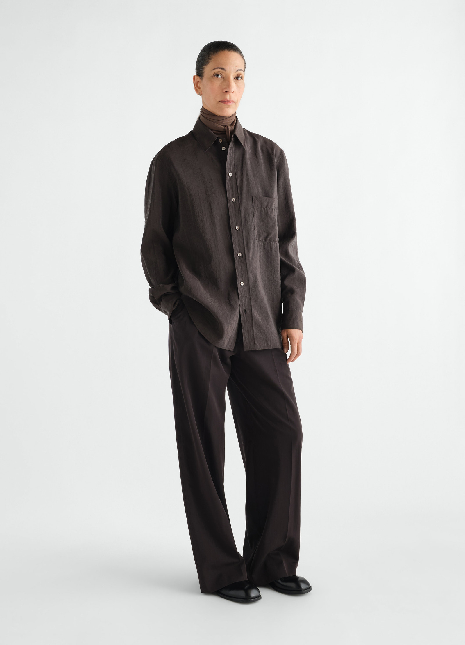 Straight shirt in dark brown dry silk worn by model, front view, lemaire