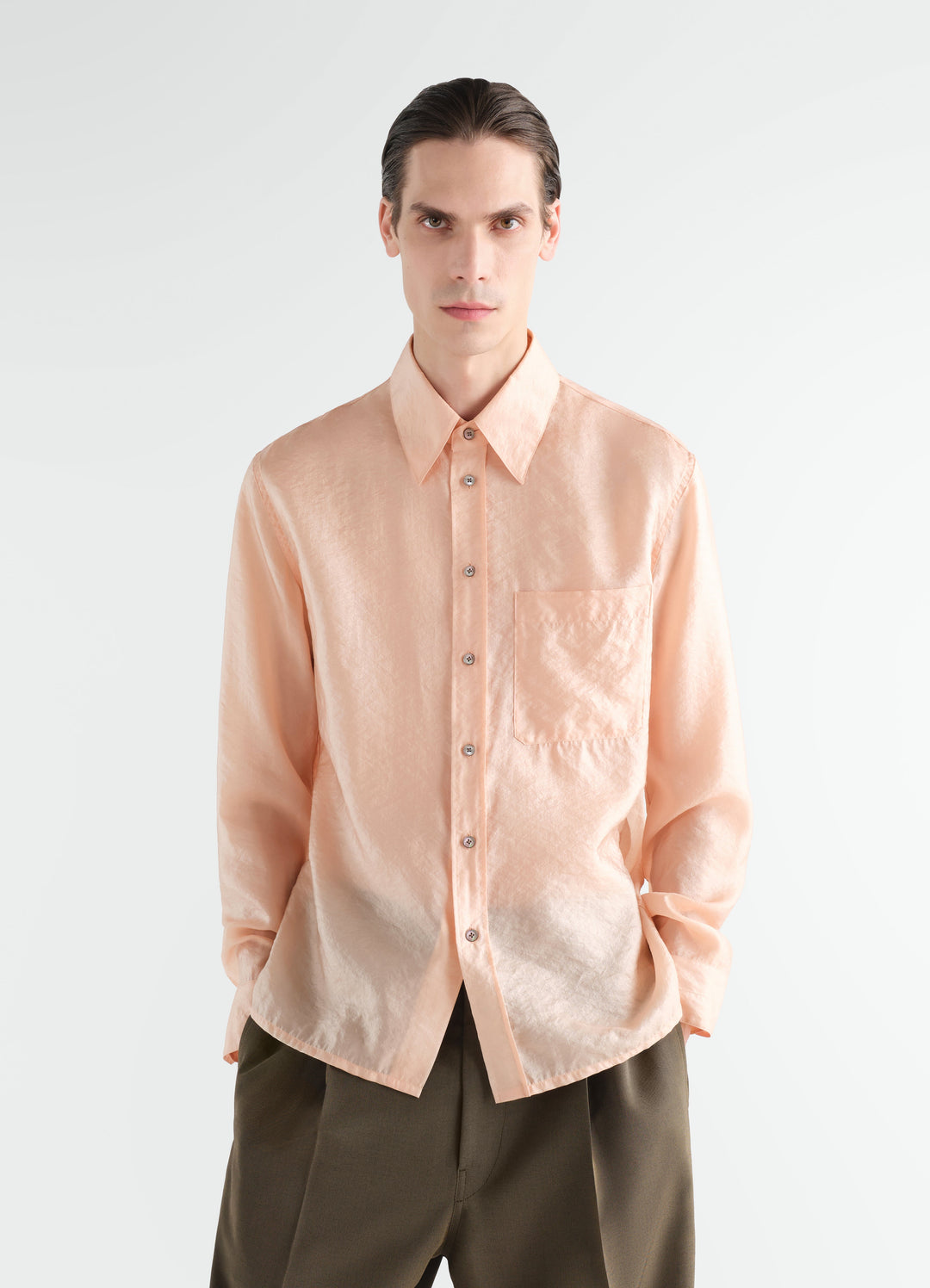 Fitted shiny peach cupro shirt with chest pocket by LEMAIRE worn by model front view