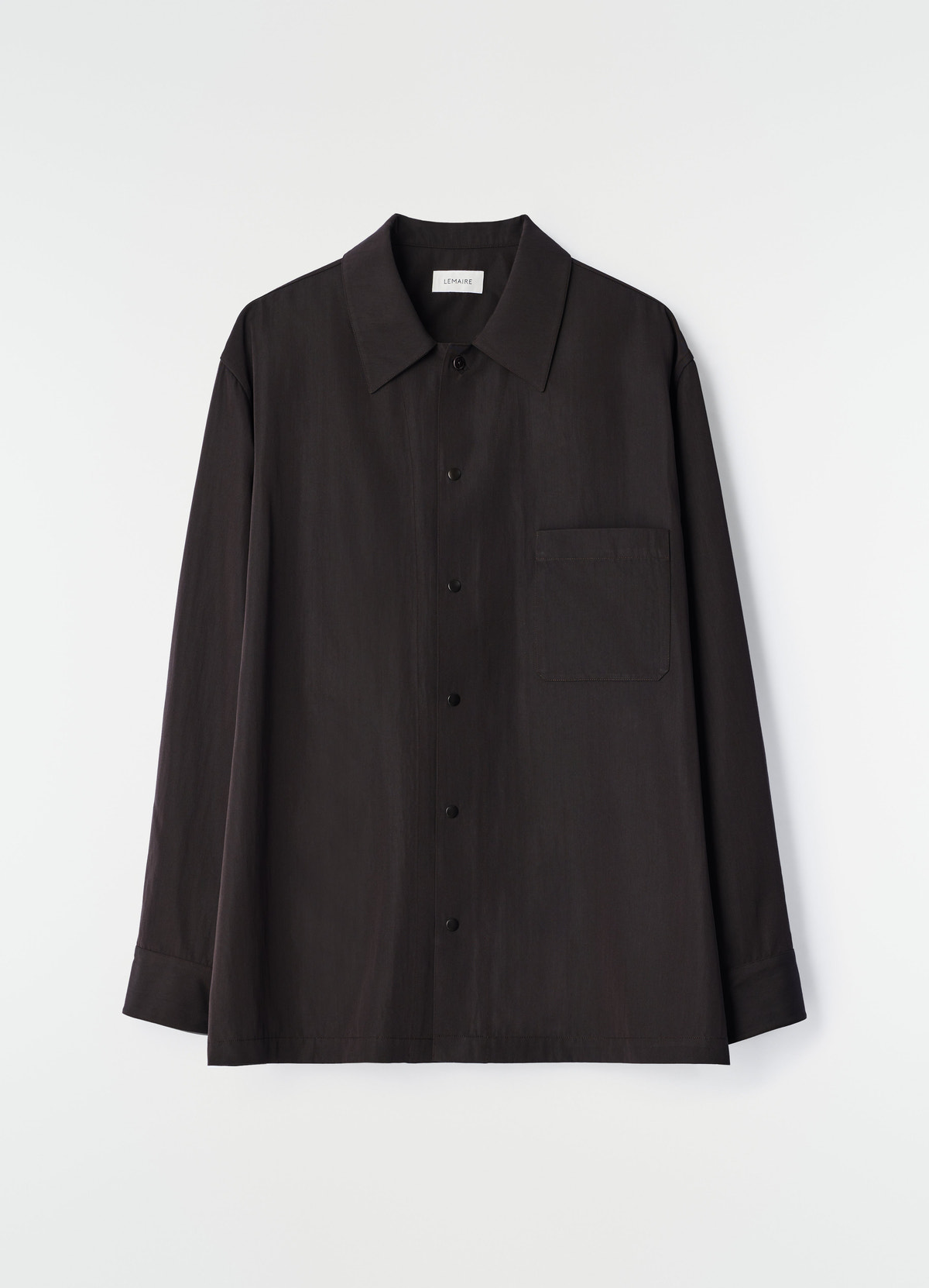 Light black wool gabardine overshirt with chest pocket by lemaire on plain white background