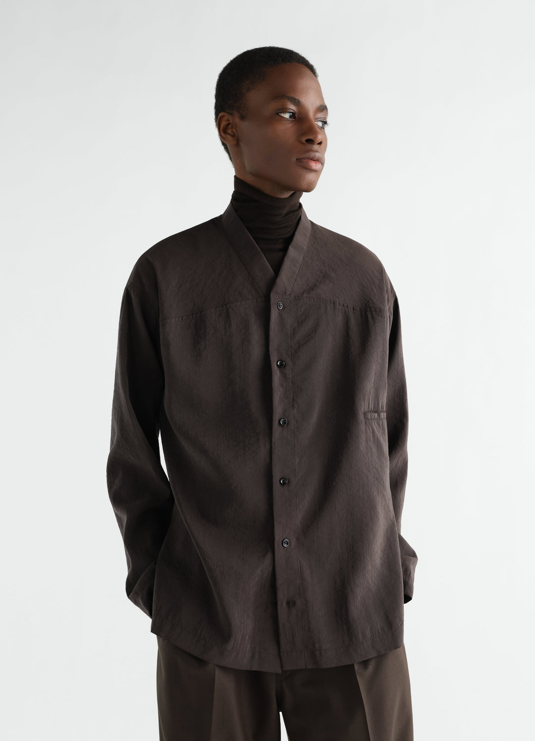 V-neck dry silk shirt in dark brown worn by model front view LEMAIRE