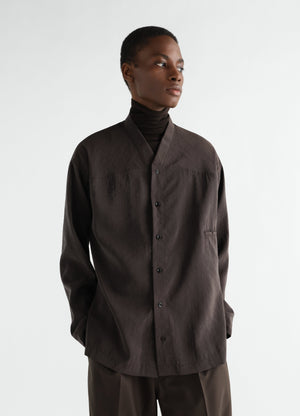 V-neck dry silk shirt in dark brown worn by model front view lemaire