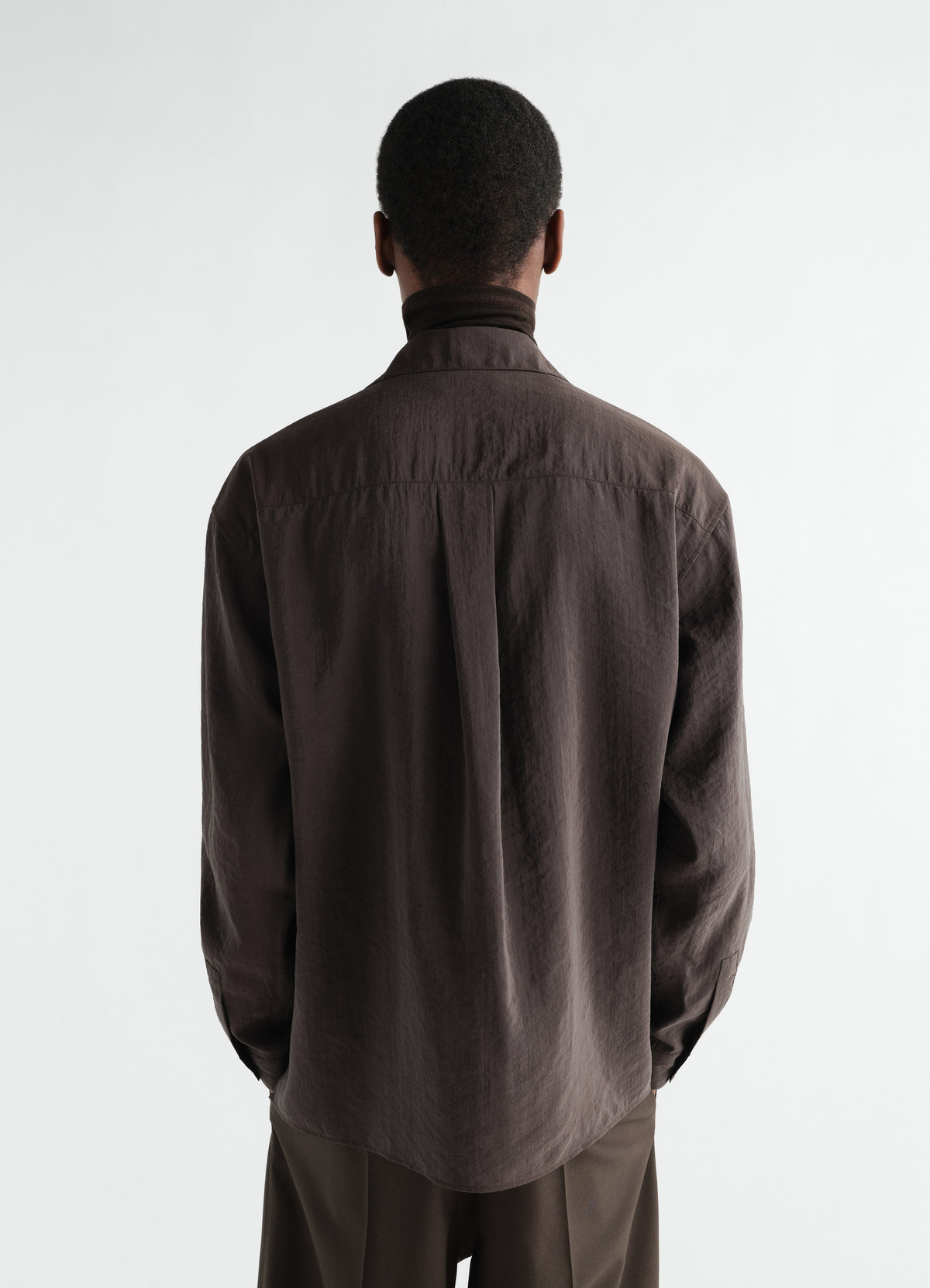 Convertible collar dark brown dry silk shirt lemaire back view worn by model