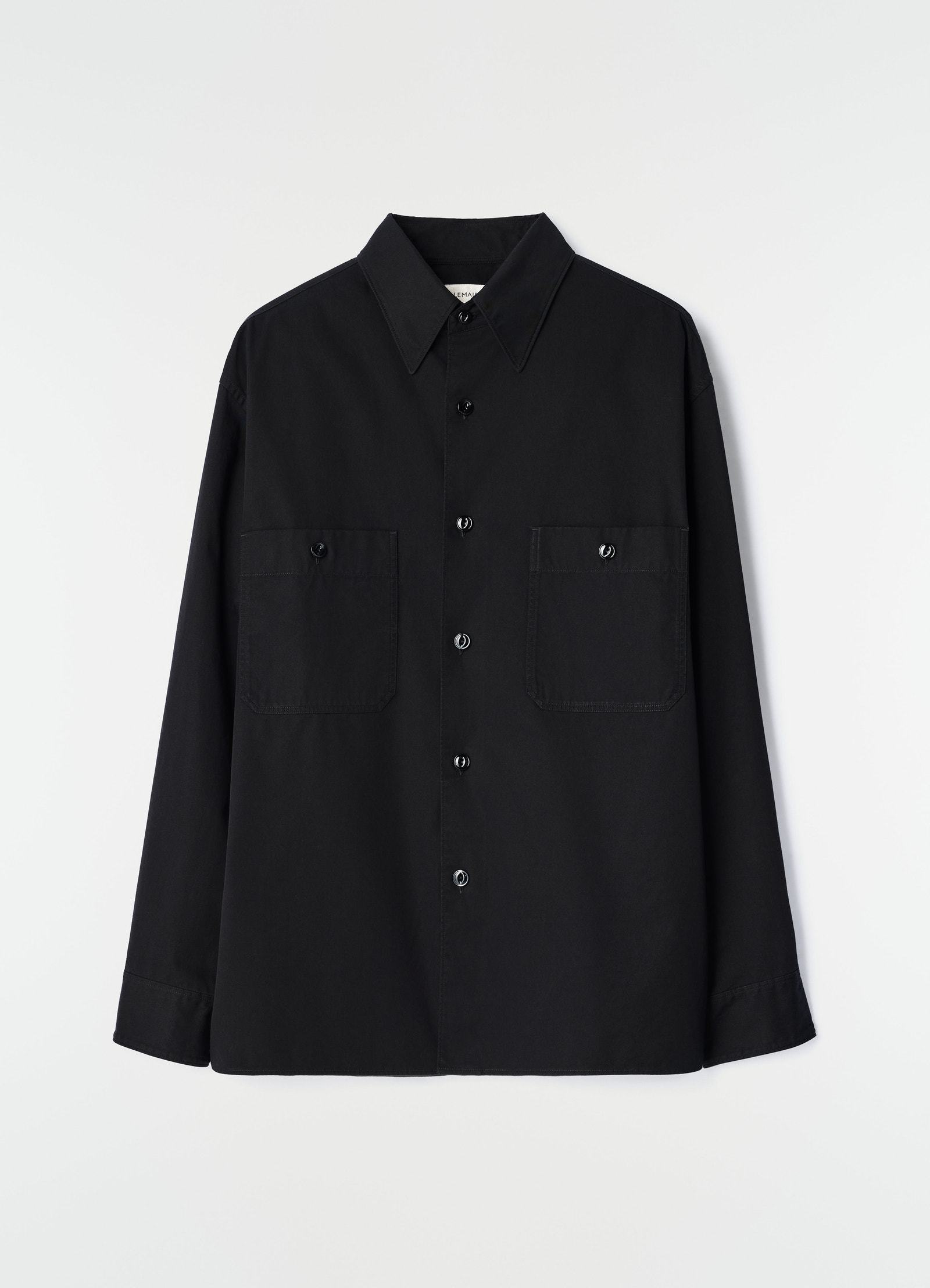 Two-pocket black light cotton twill shirt by lemaire front view on plain white background