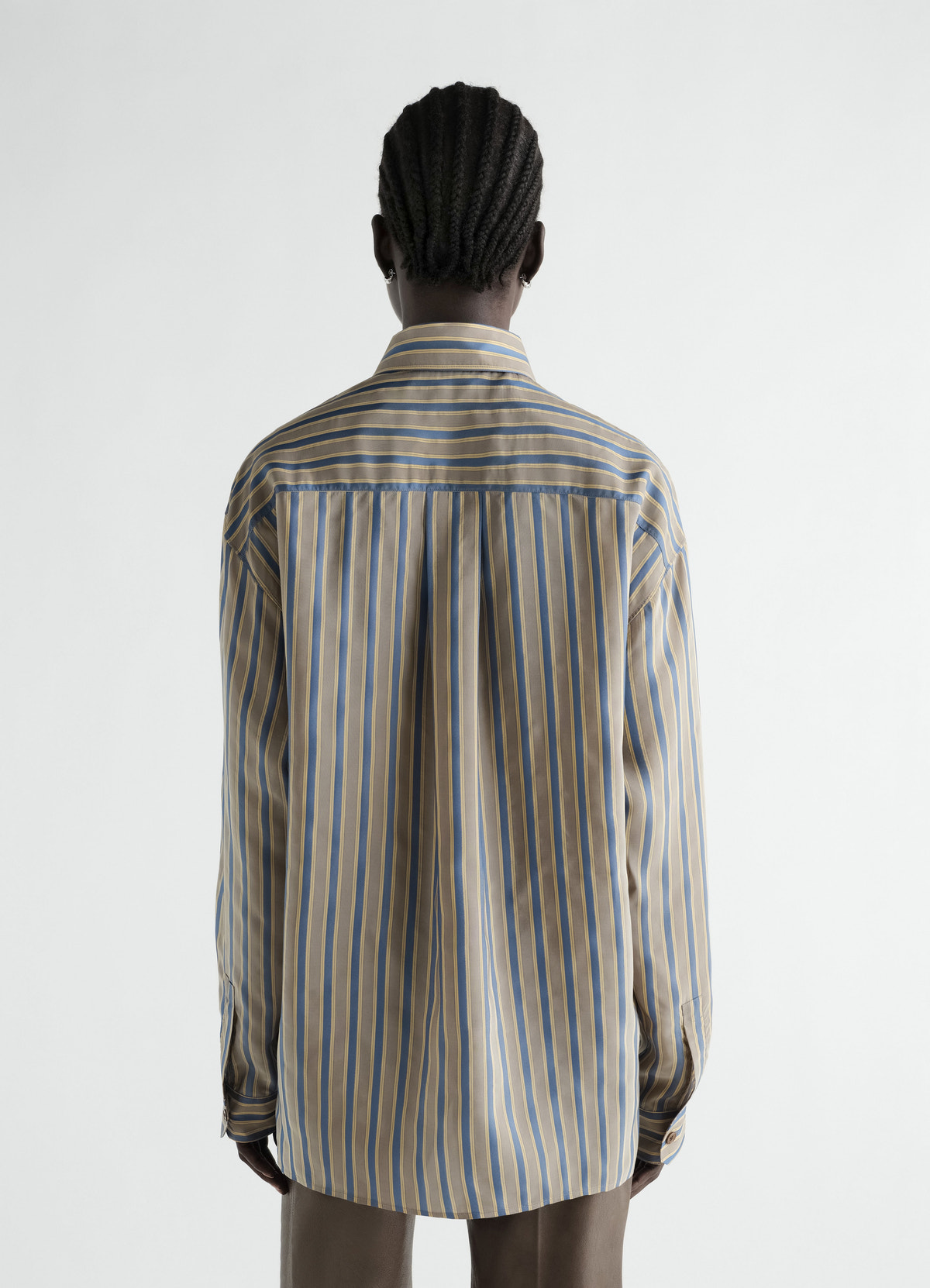 Convertible-collar striped cupro shirt in beige and blue by lemaire worn by model back view