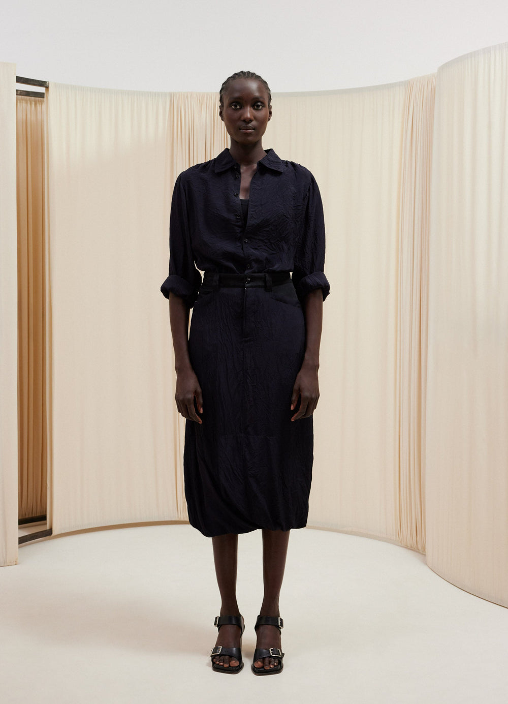 Lemaire Twisted Hem Skirt in Silky Viscose Crinkled, model shot, front view twisted hem volume